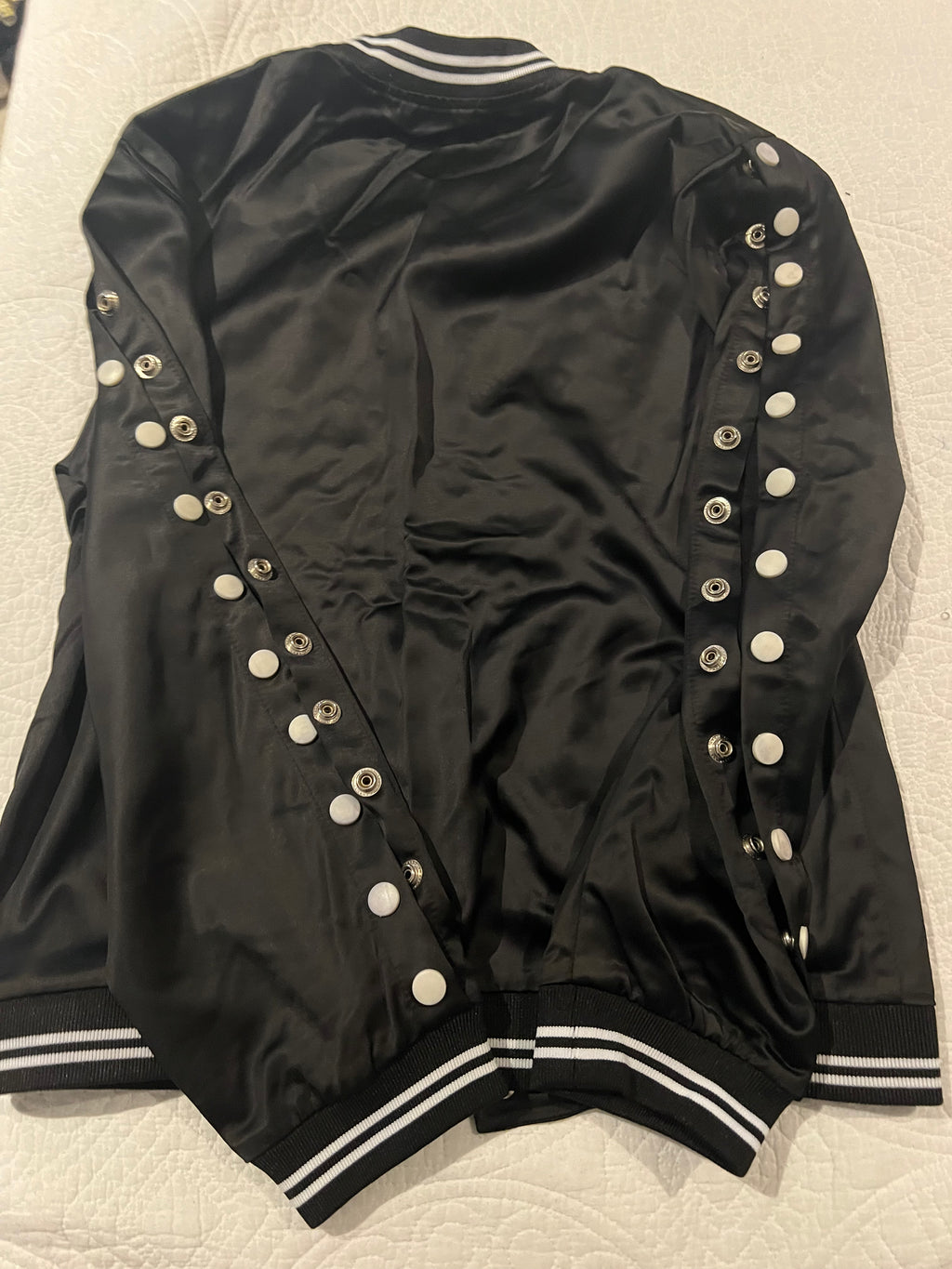 Black jacket with button up sleeves