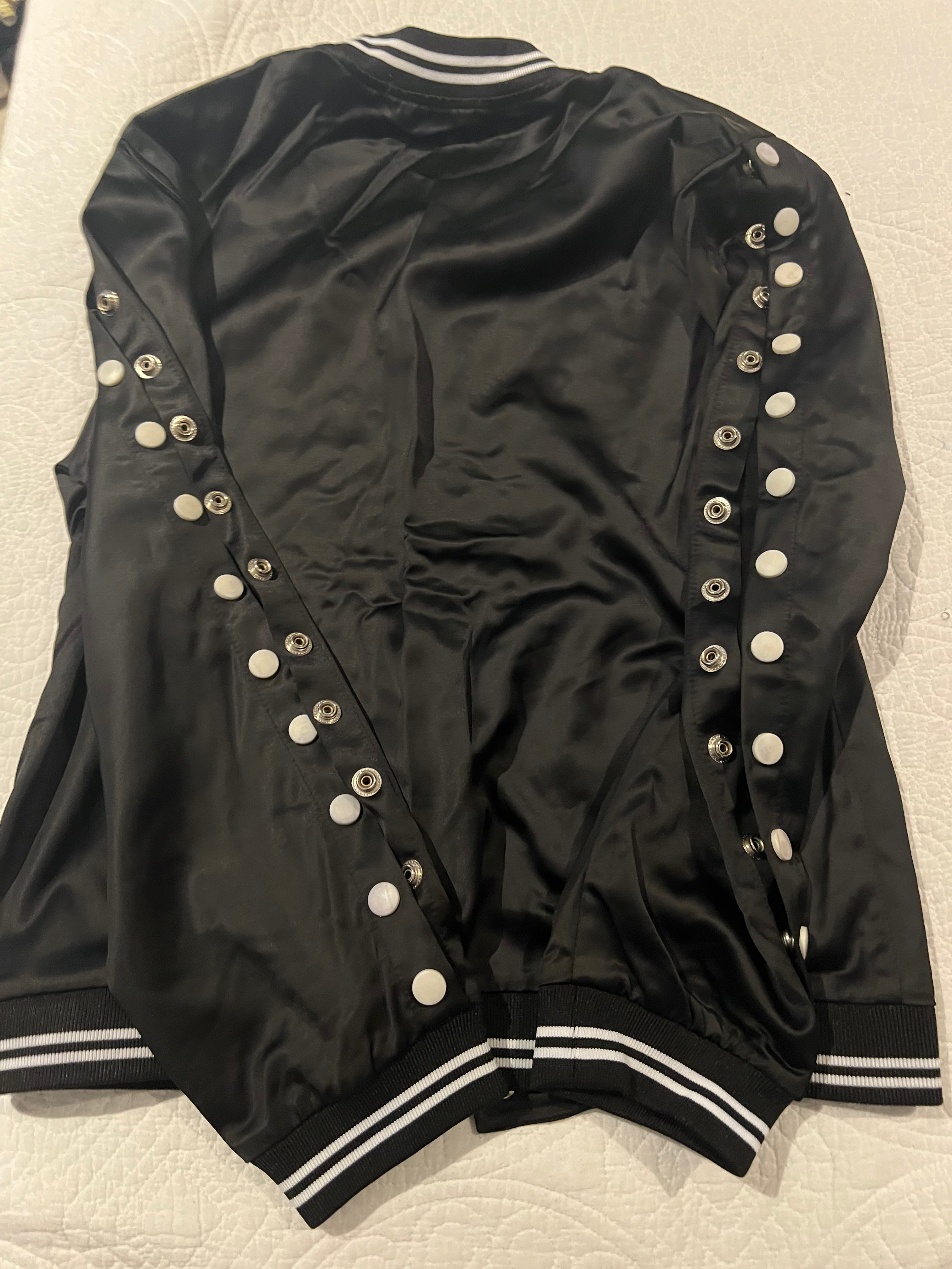 Black jacket with button up sleeves
