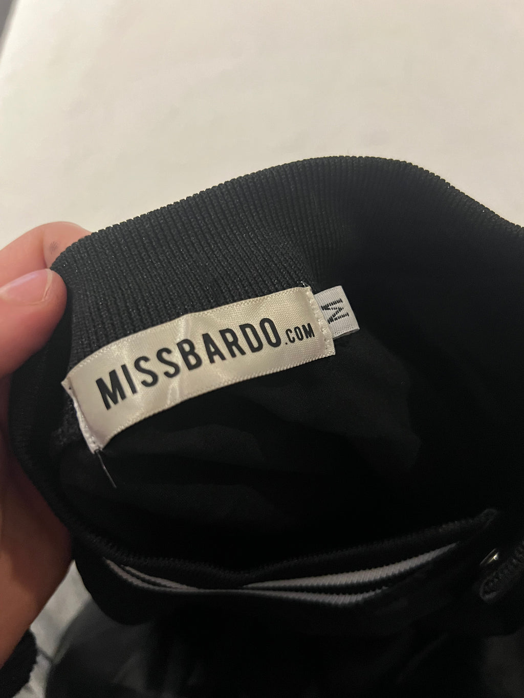 Black jacket with button up sleeves