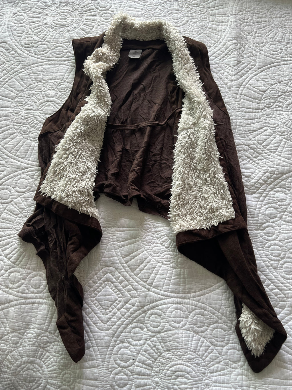 Brown vest with faux fur on inside