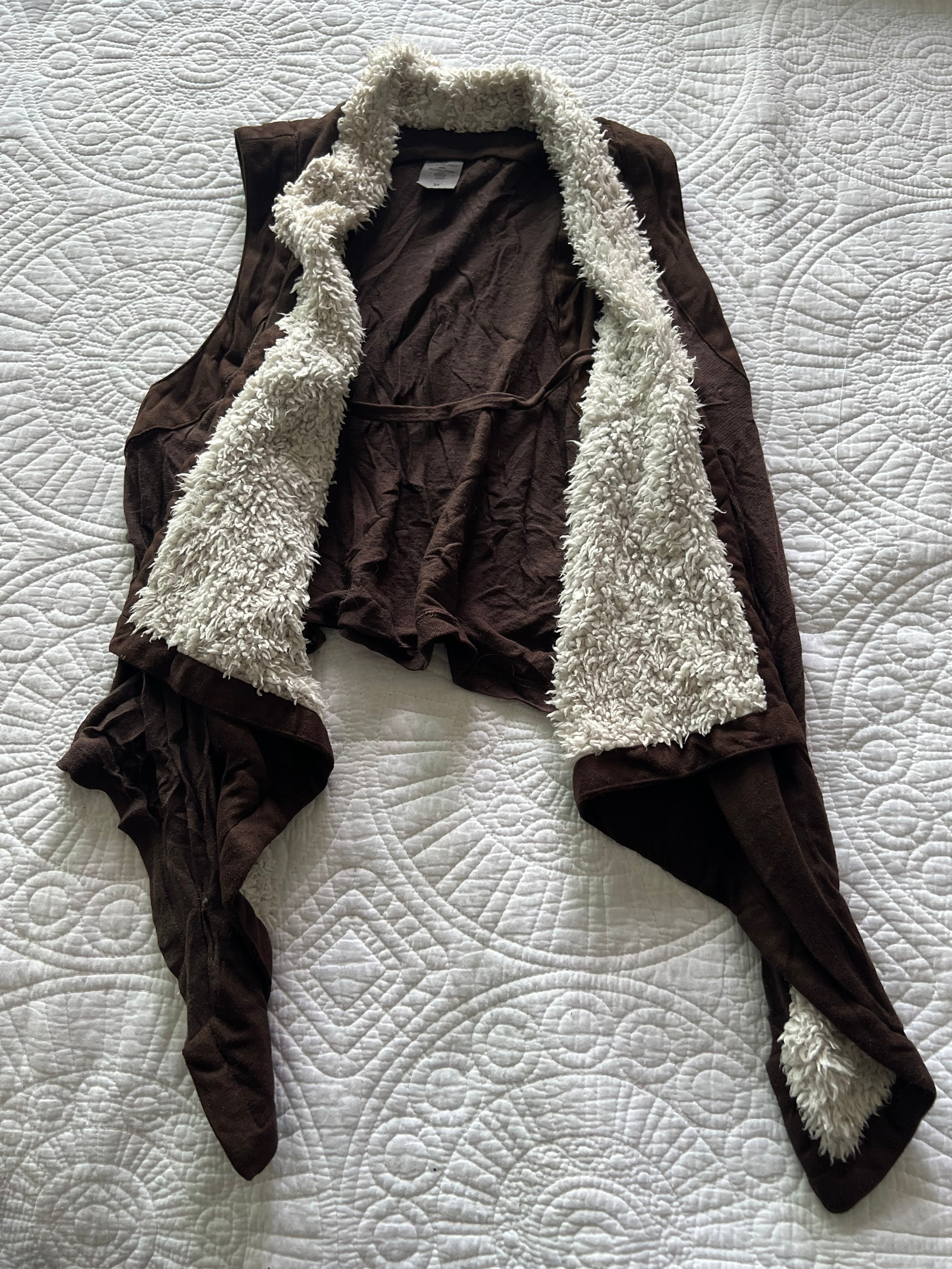 Brown vest with faux fur on inside