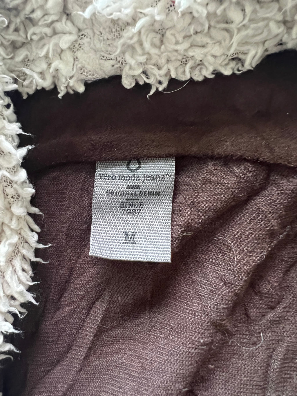 Brown vest with faux fur on inside