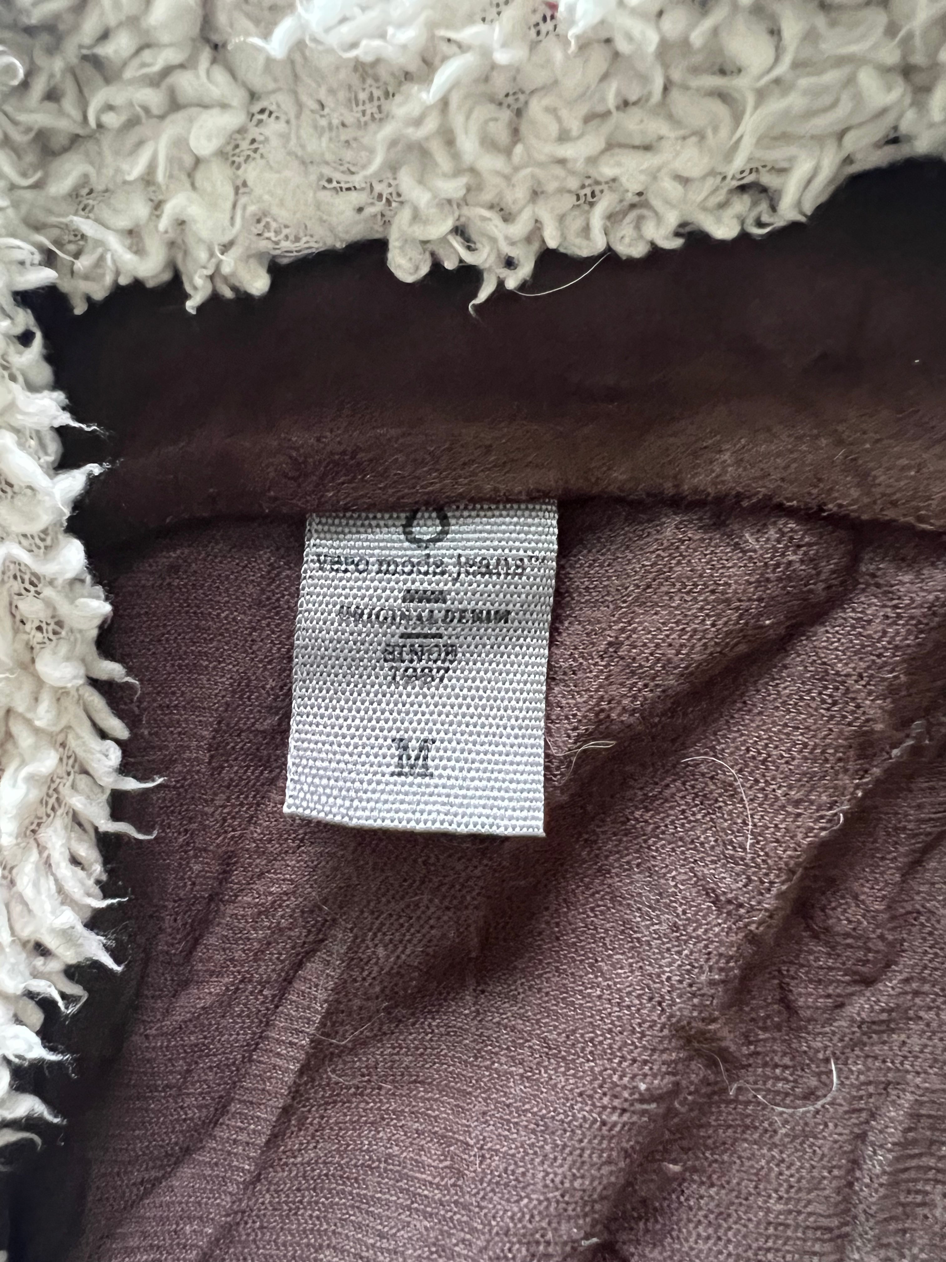 Brown vest with faux fur on inside