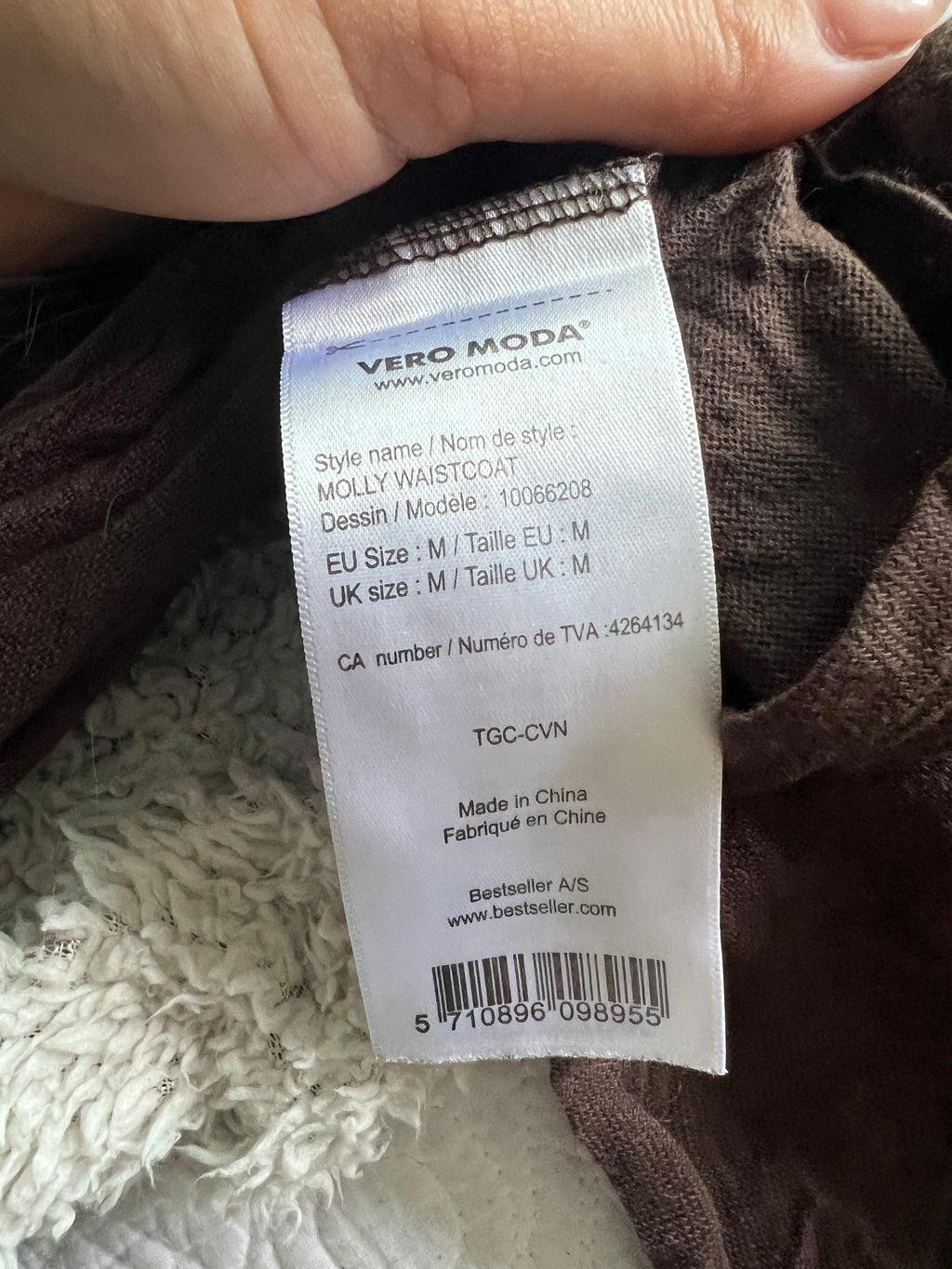 Brown vest with faux fur on inside