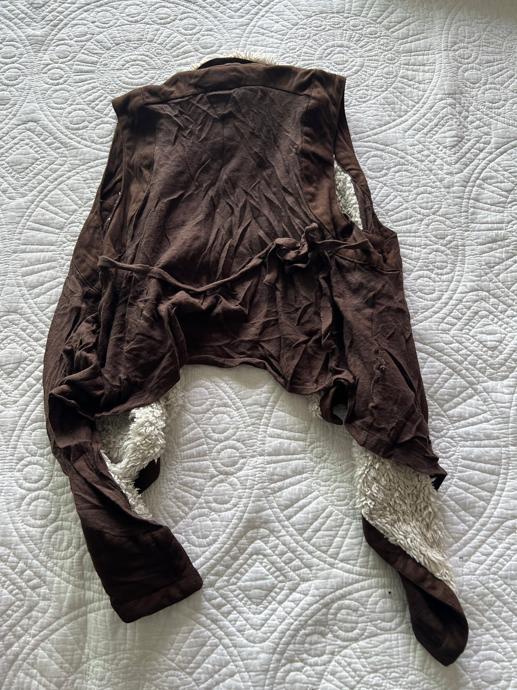 Brown vest with faux fur on inside