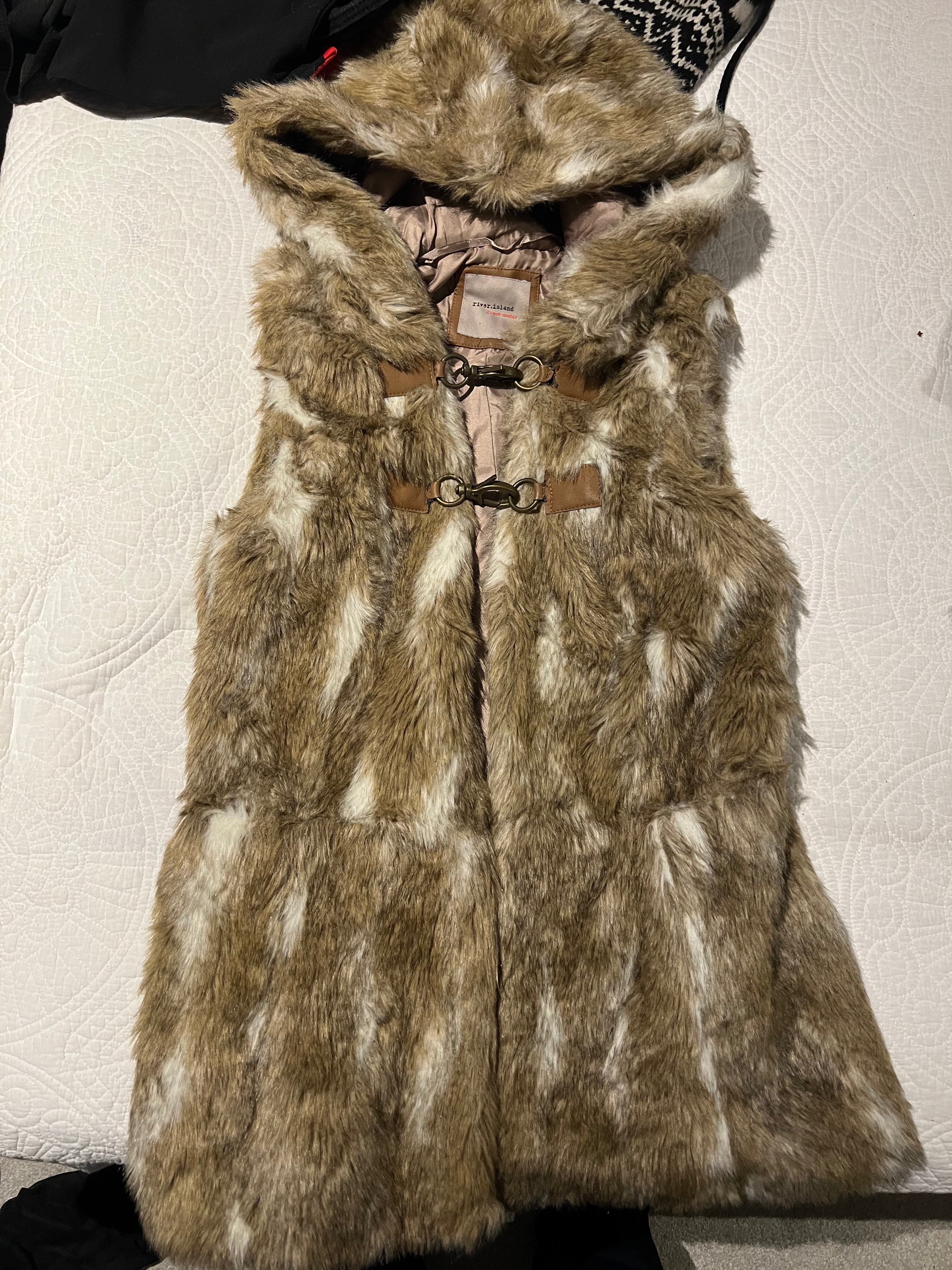 Faux fur vest with hood