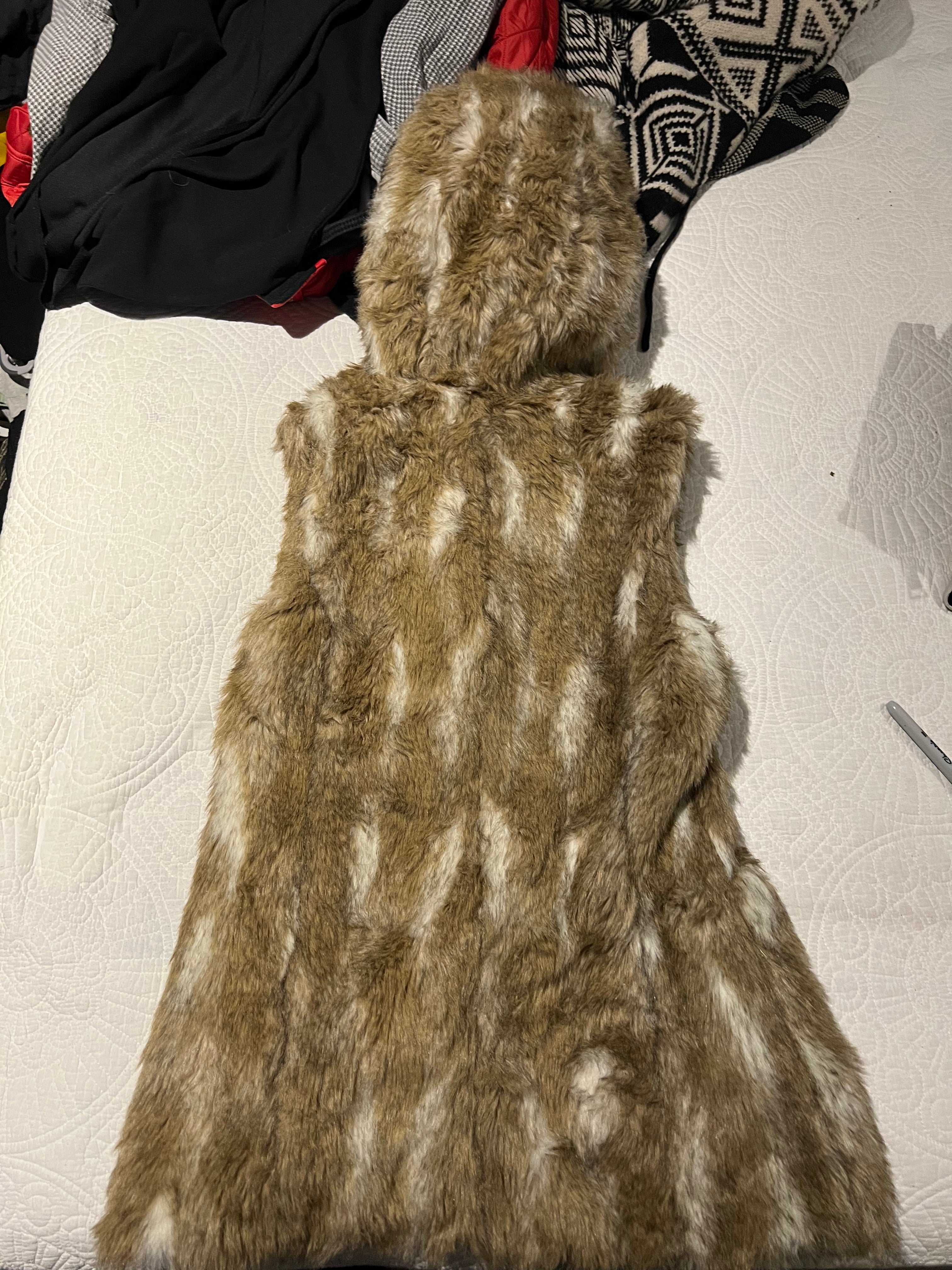 Faux fur vest with hood