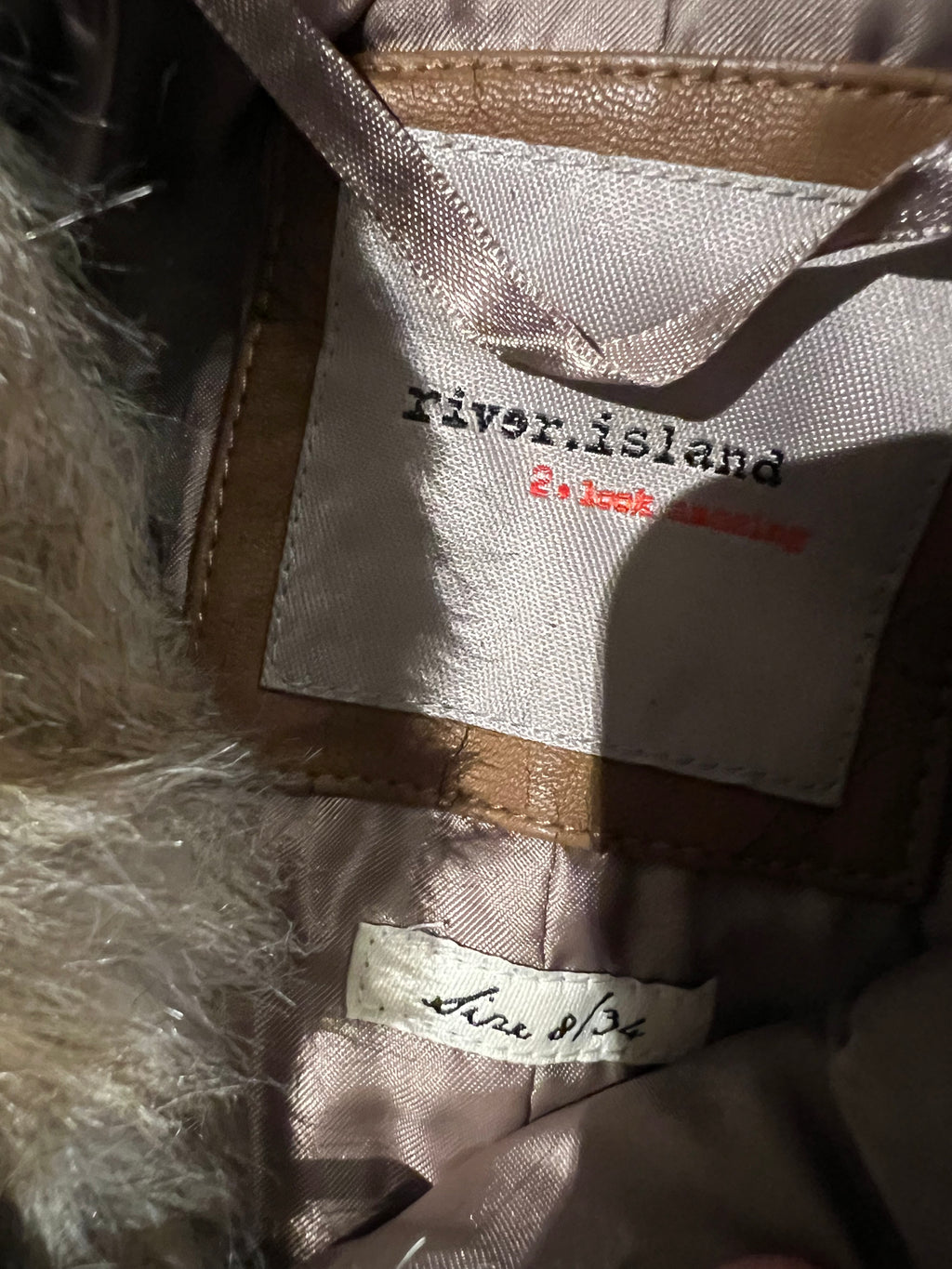 Faux fur vest with hood
