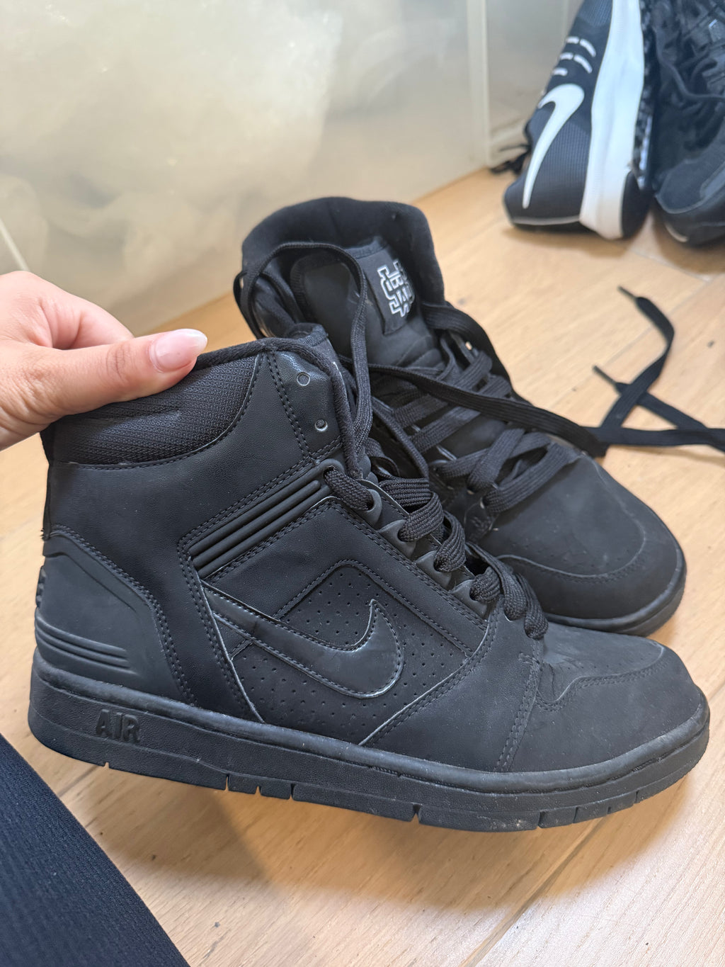 High top black Nike trainers