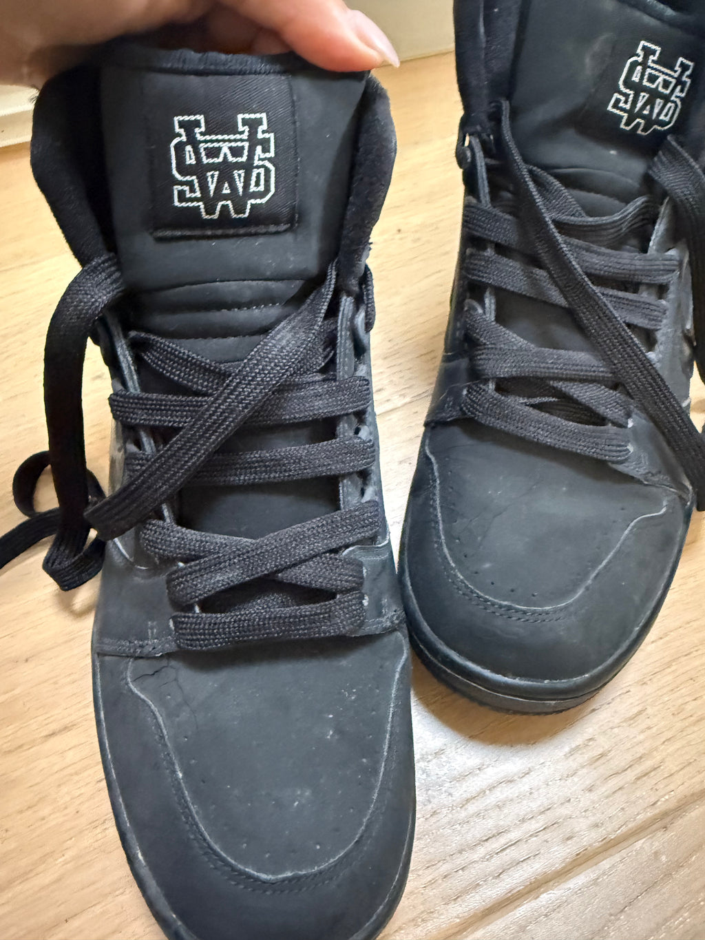 High top black Nike trainers