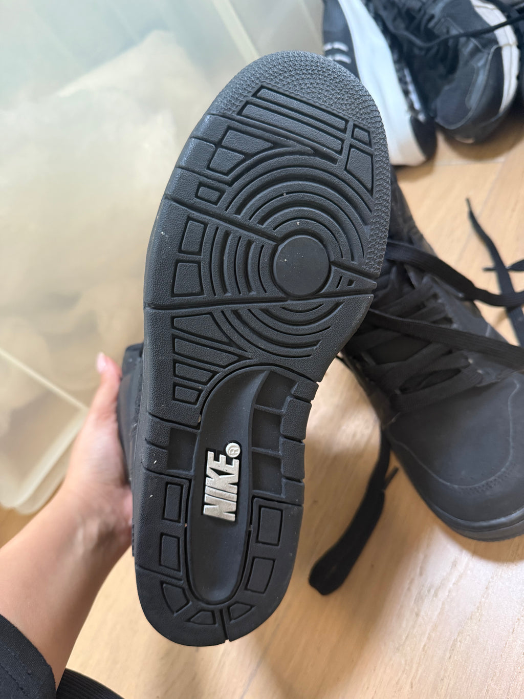 High top black Nike trainers