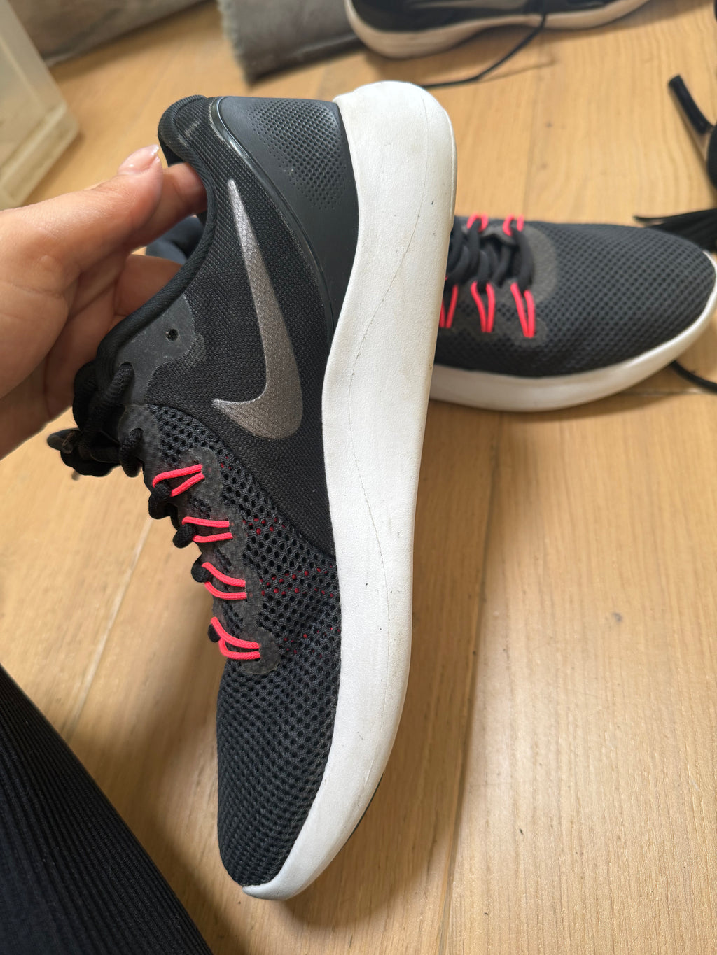 Black and white nike running shoes