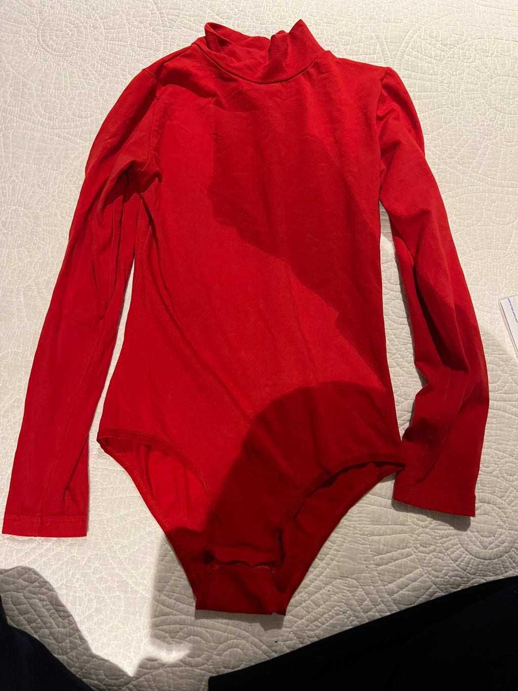 Red turtle neck bodysuit
