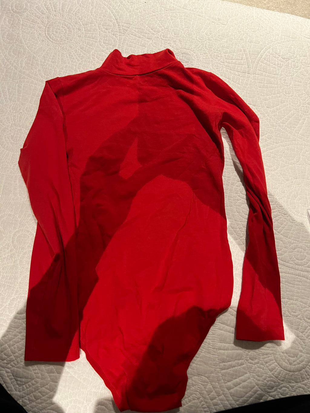 Red turtle neck bodysuit