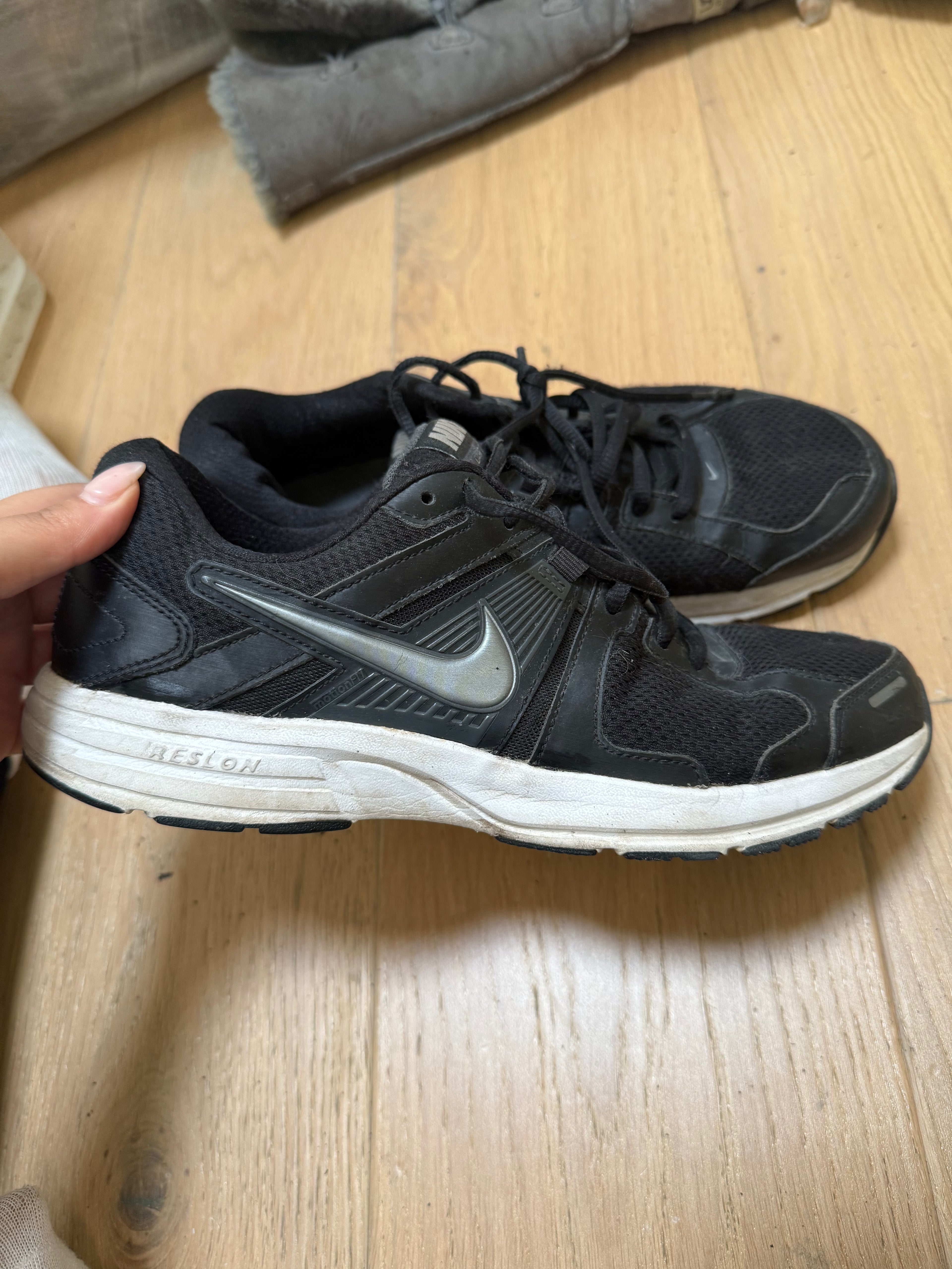 Black Nike trainers