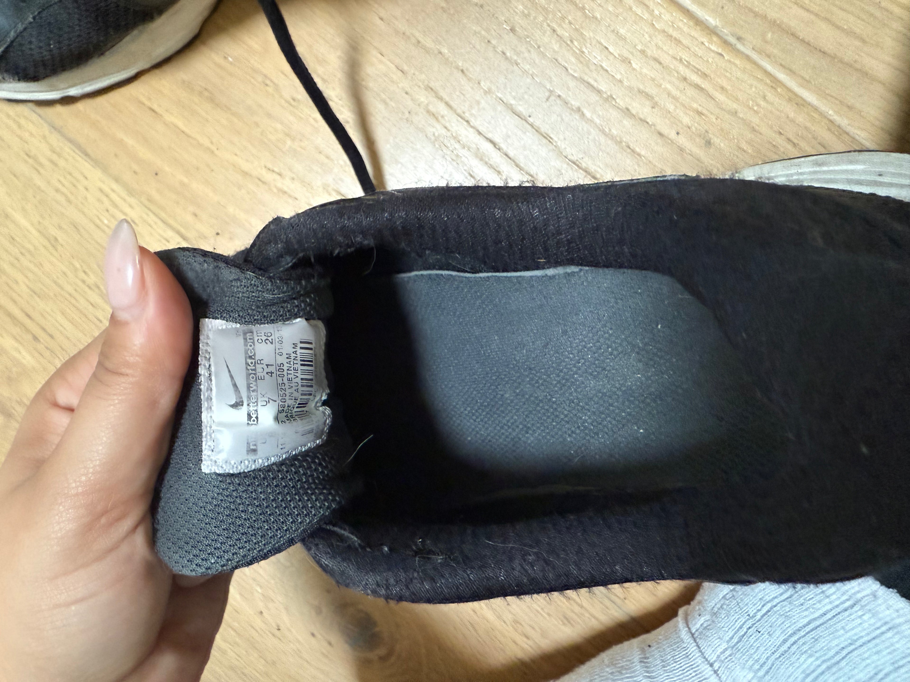 Black Nike trainers