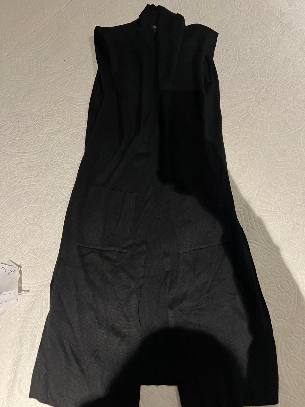 Black sleeveless cardigan