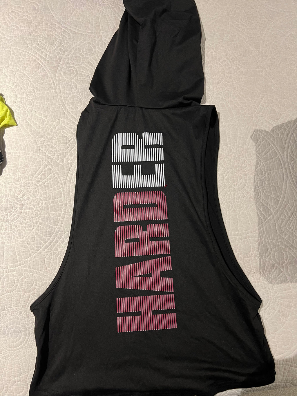 Black sleeveless top with hood