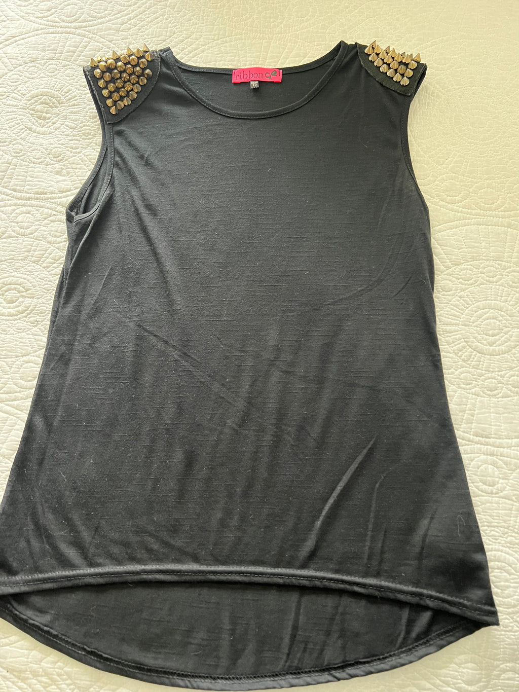Black top with spike shoulder details