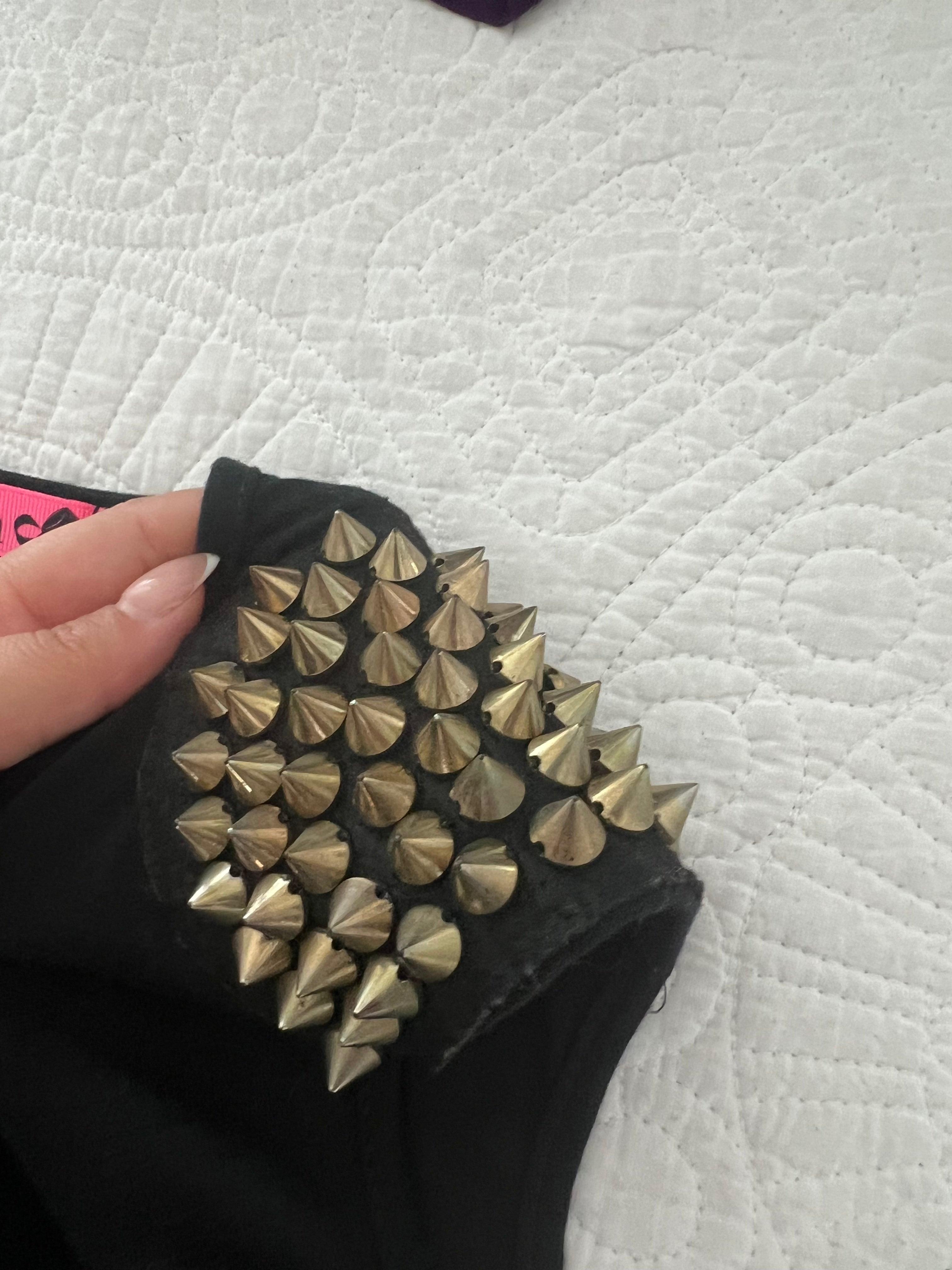 Black top with spike shoulder details