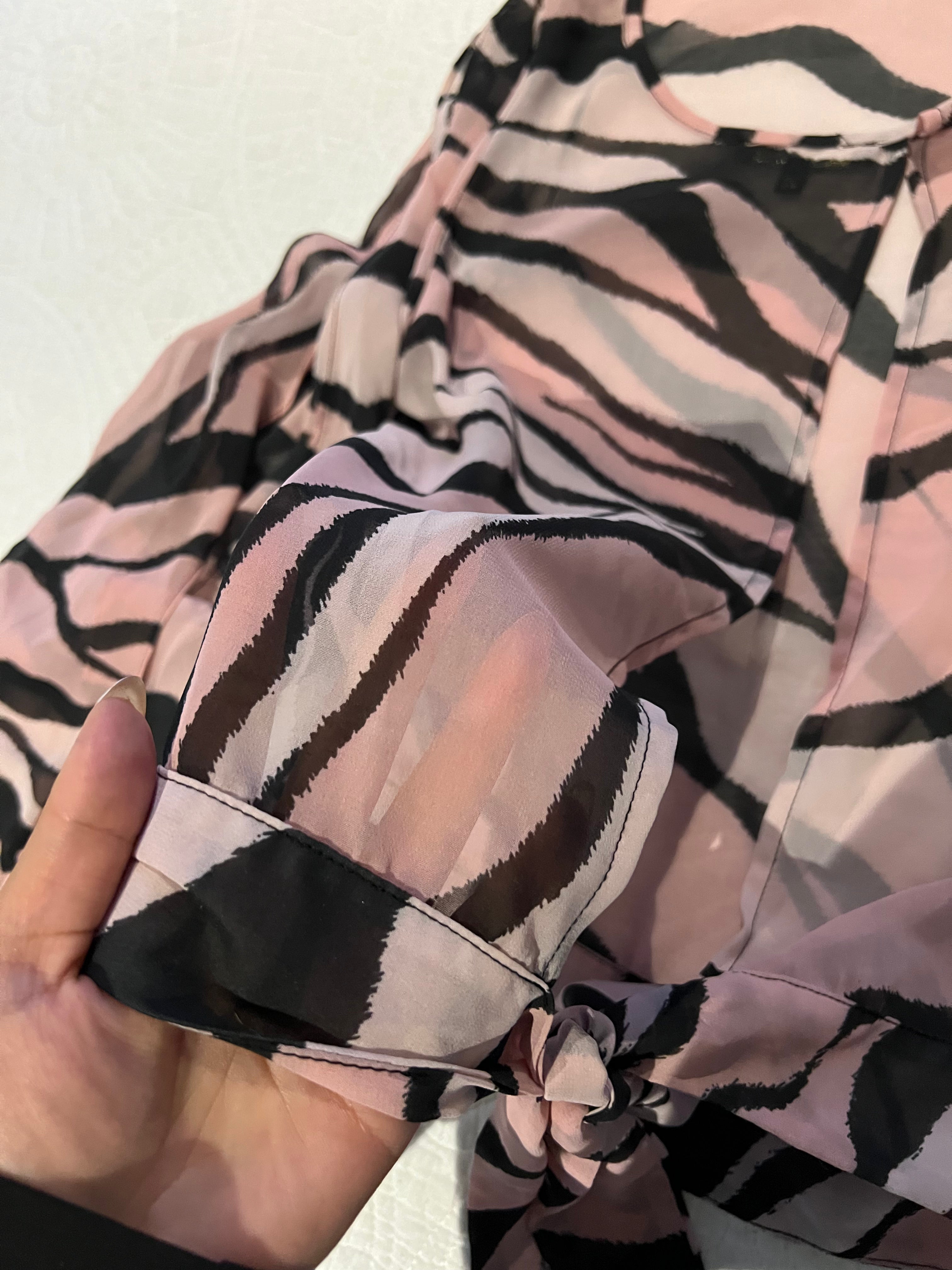 Pink zebra print top