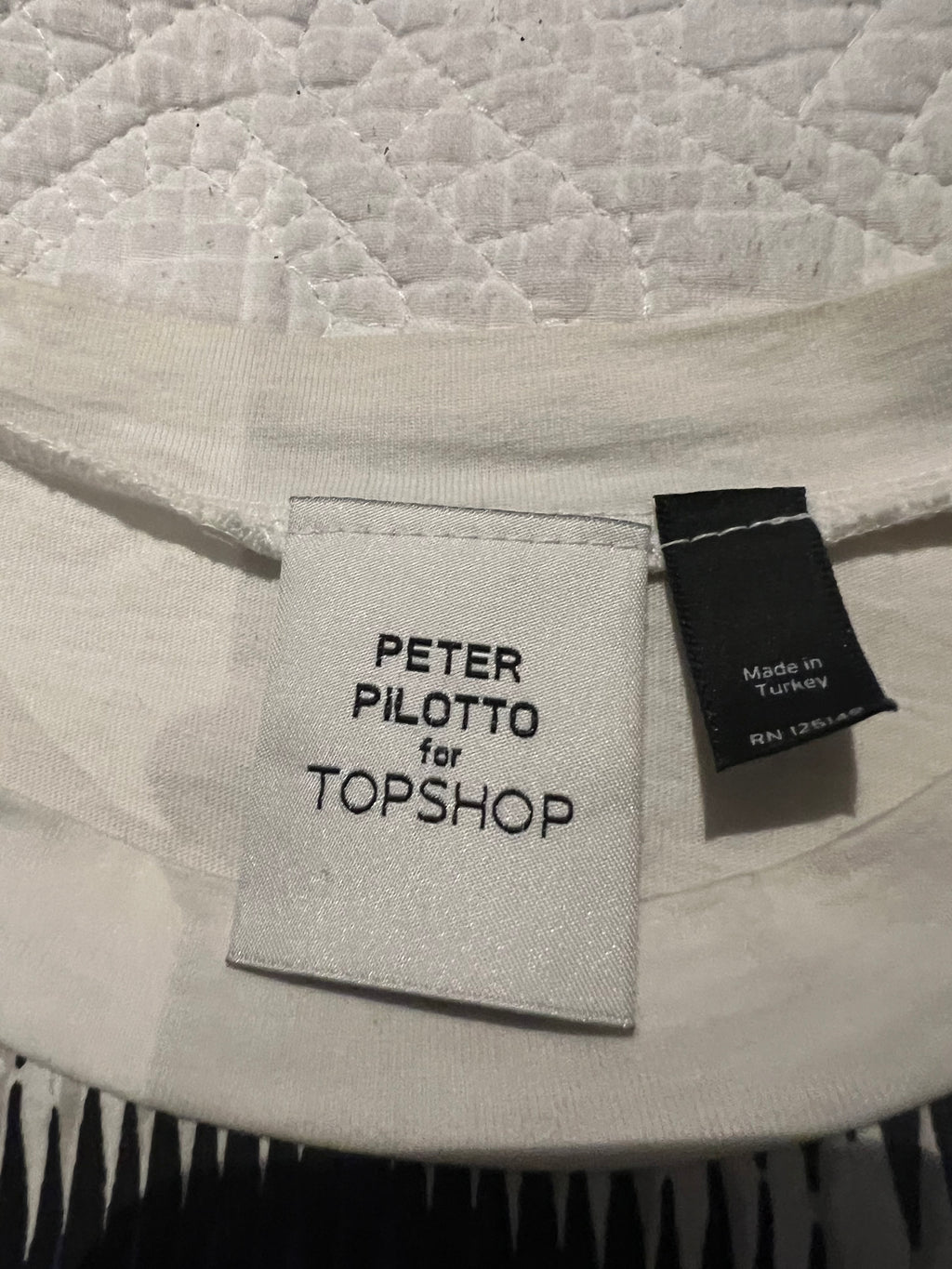 White graphic top