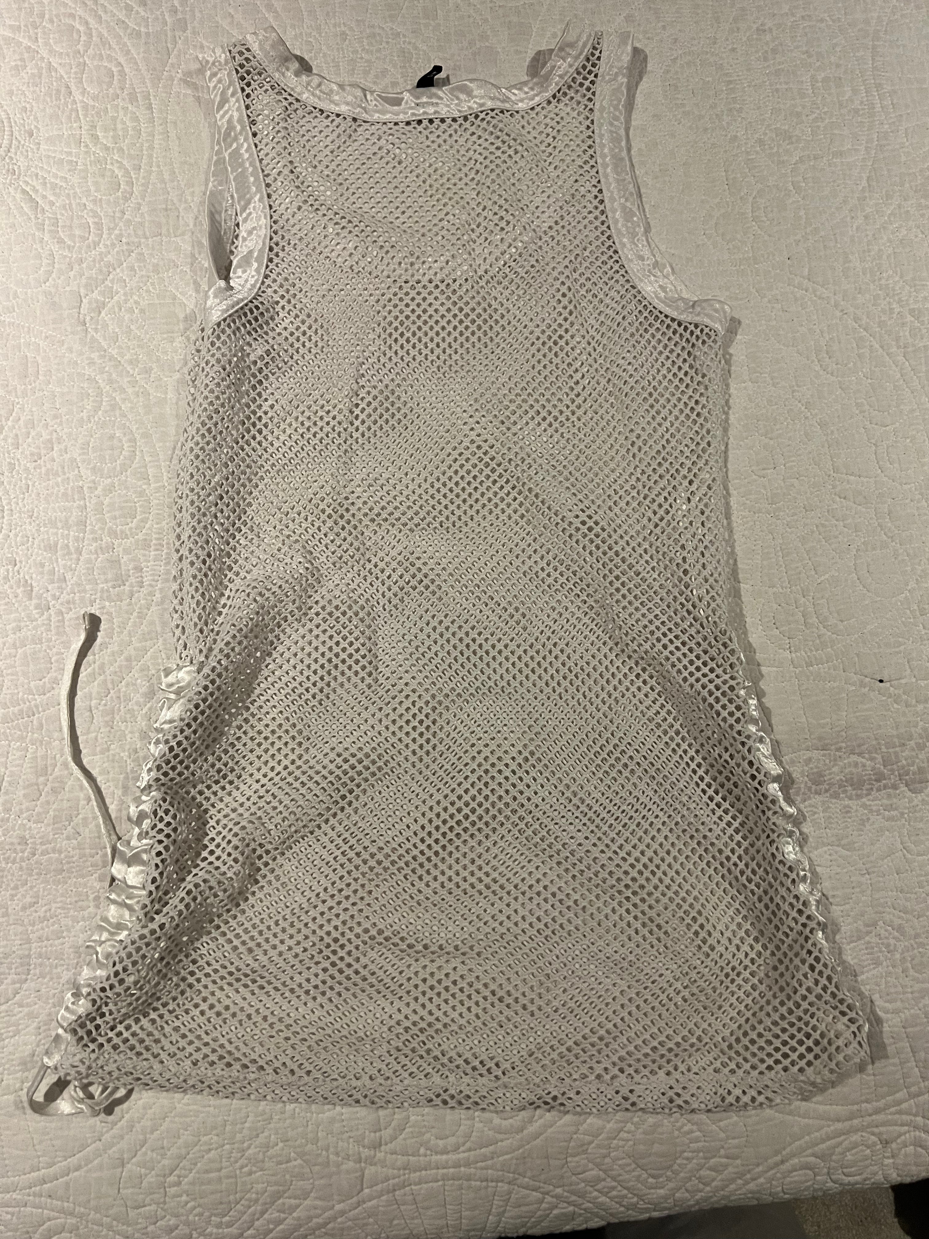 White vest top