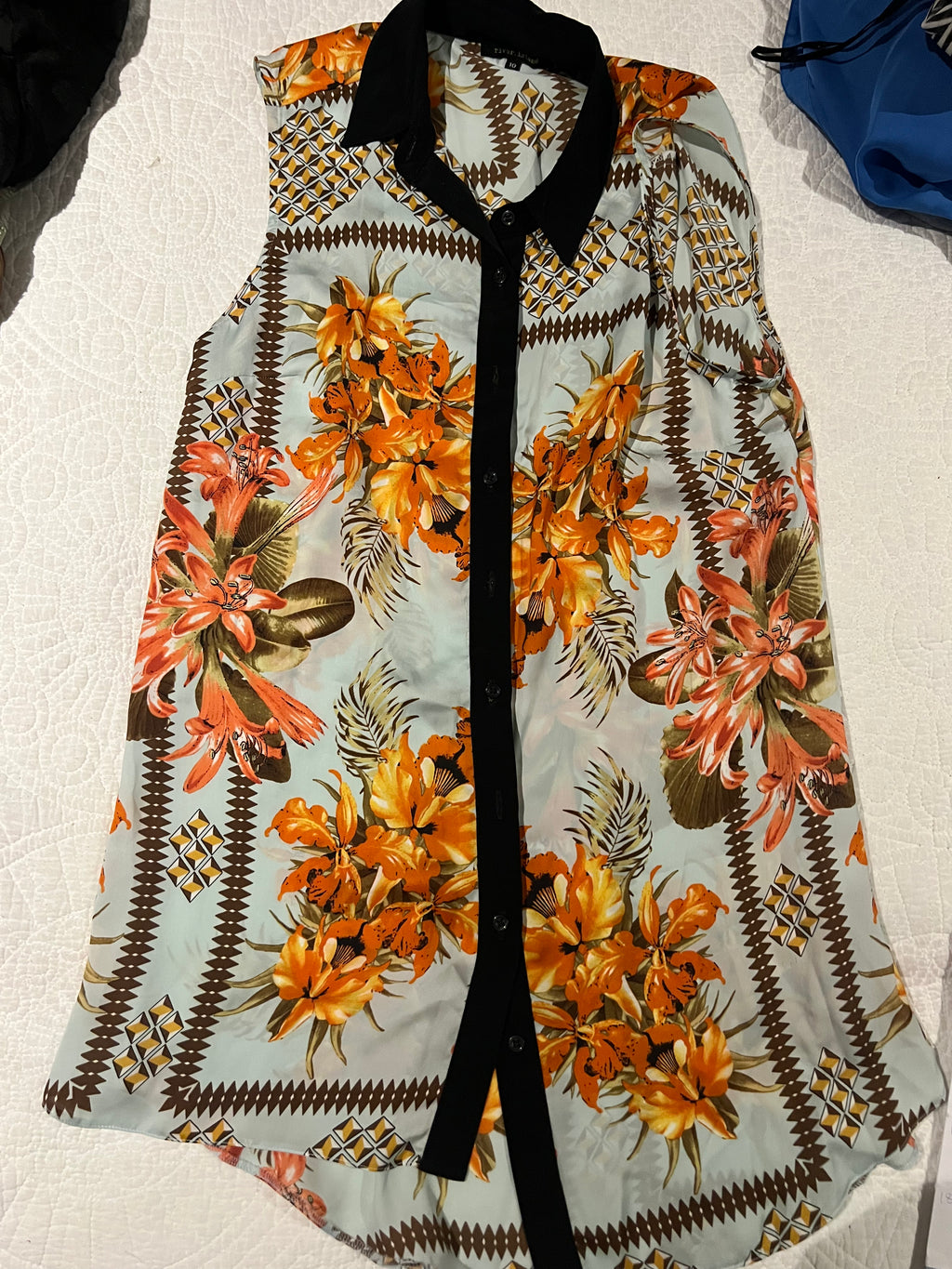 Sleeveless floral shirt