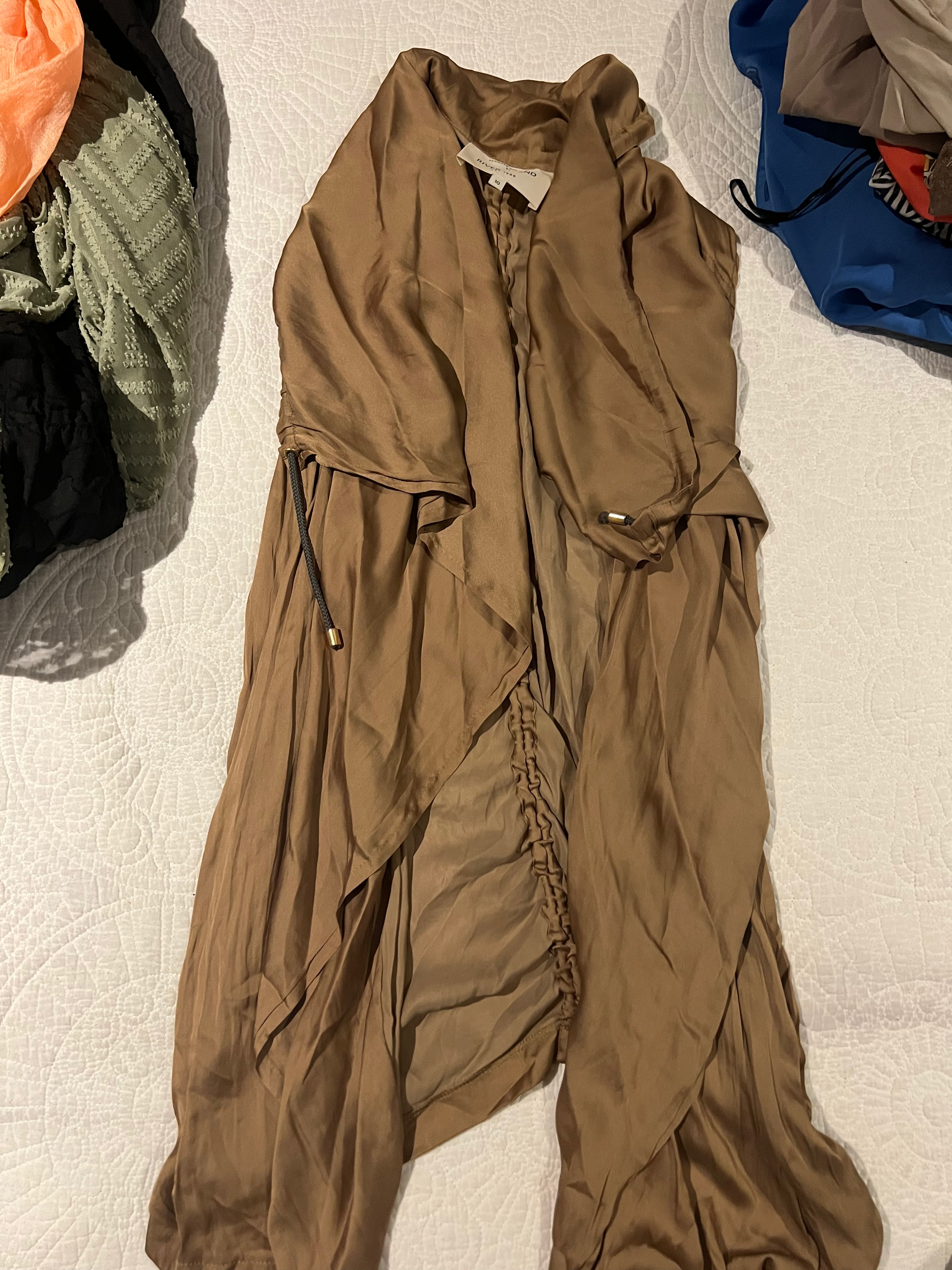 Nude sleeveless jacket