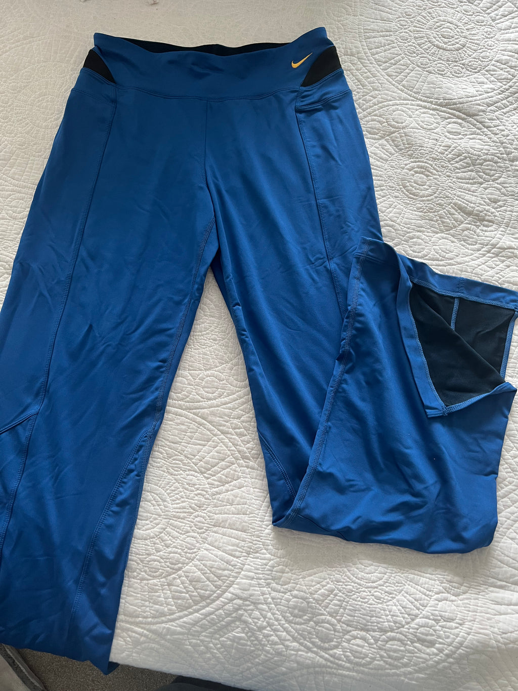 Blue Nike flares