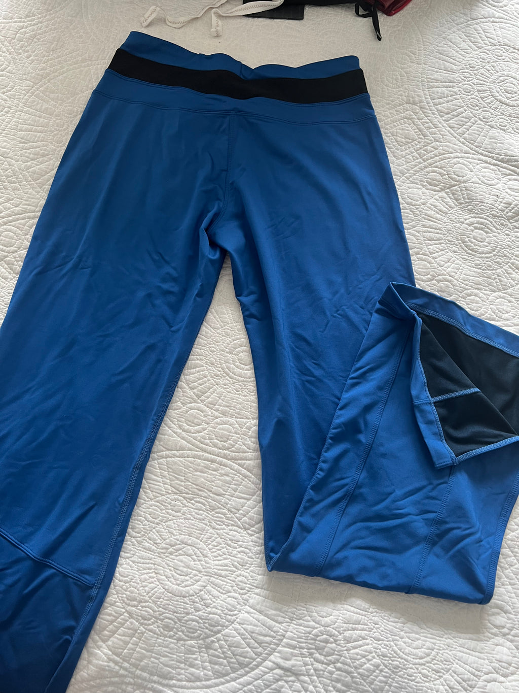 Blue Nike flares