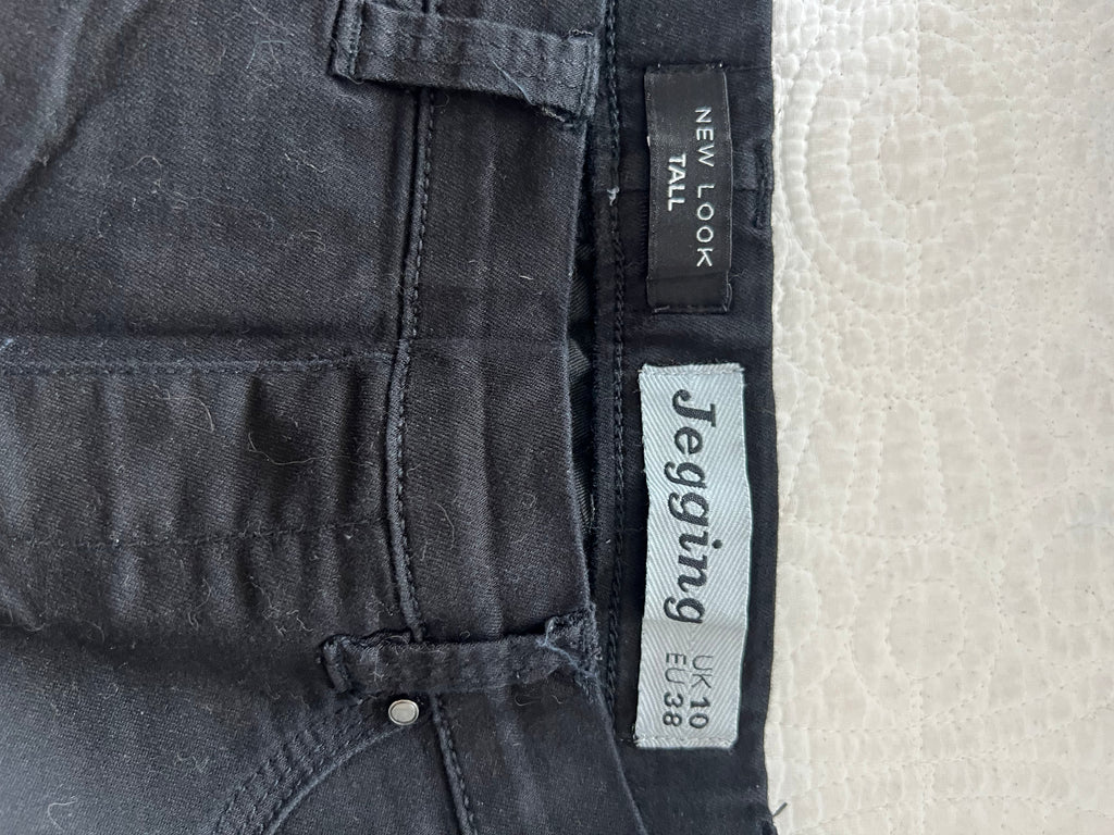 Black skinny jeans / Tall