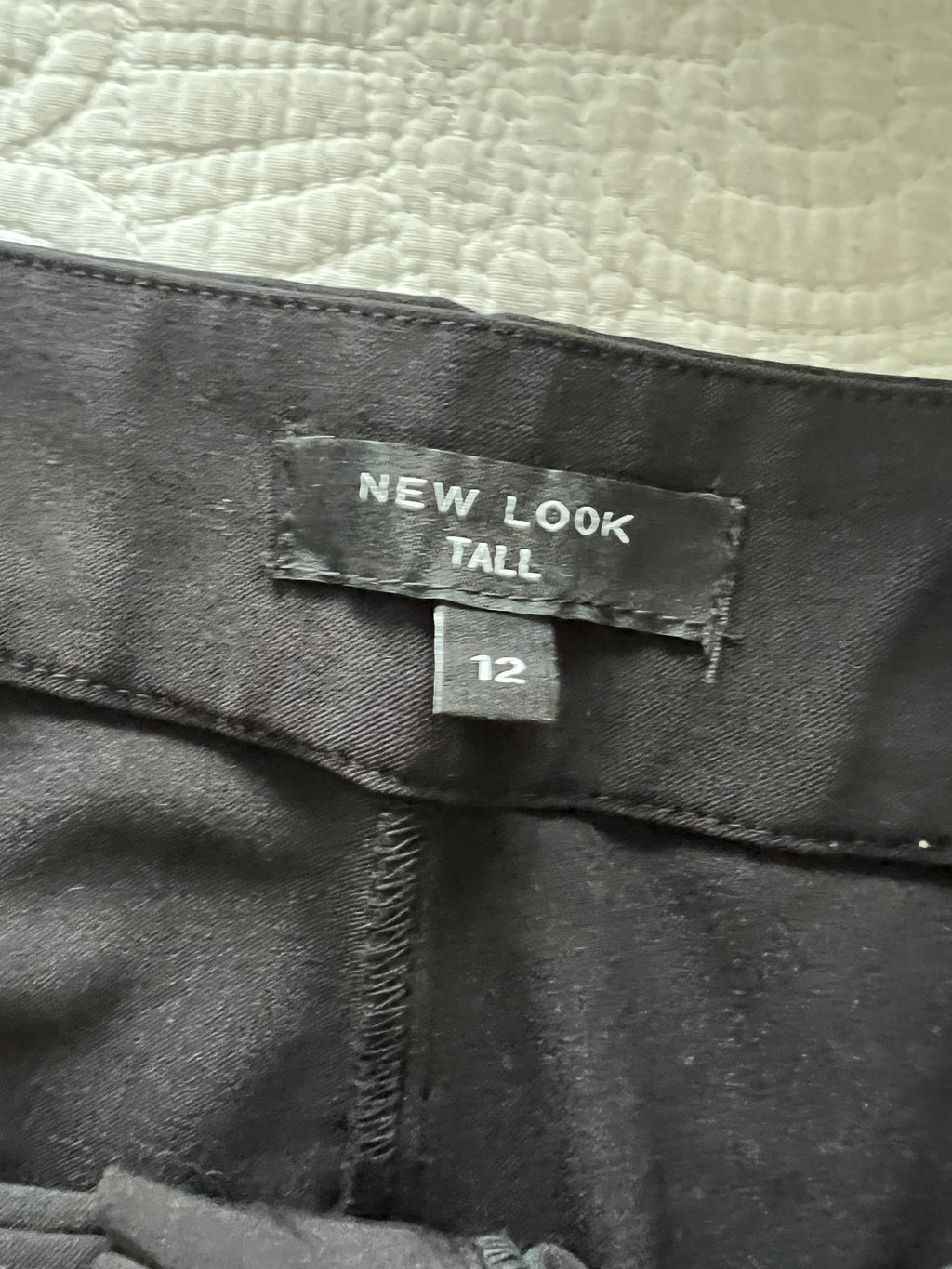 Tall black trousers