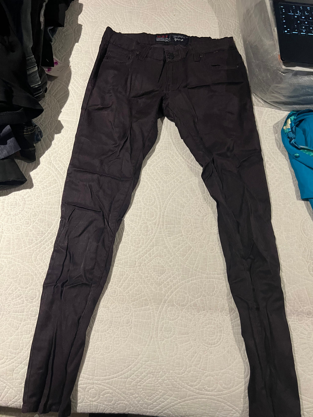 Low waisted purple skinny jeans