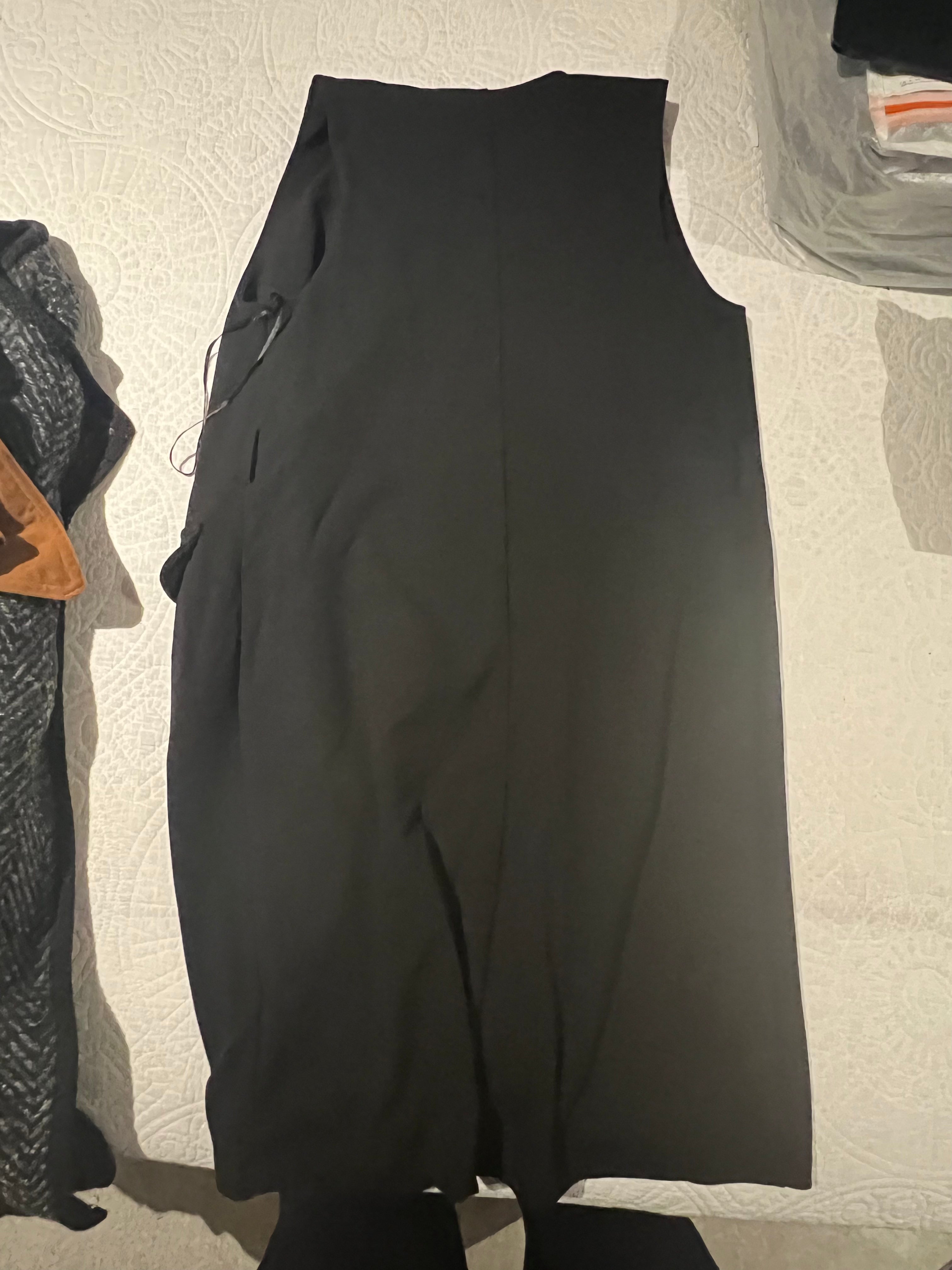 Black sleeveless jacket