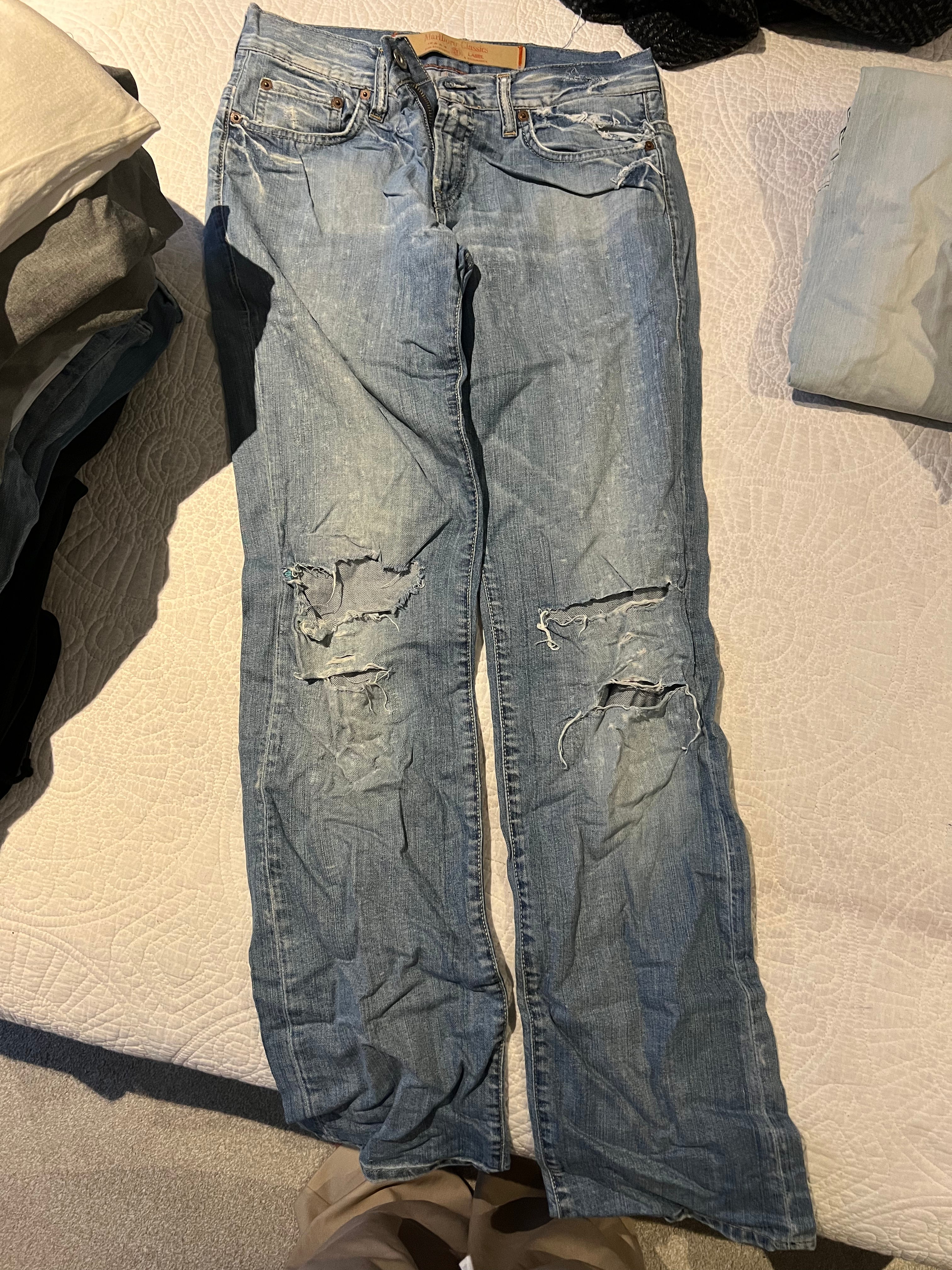 Ripped blue jeans