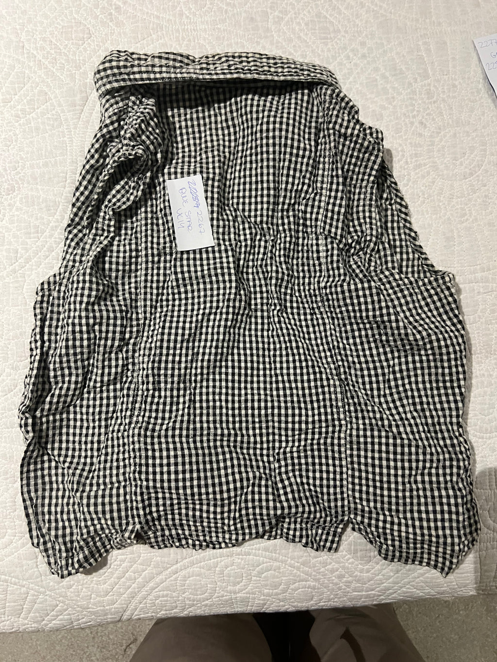 Black/white checkered shirt