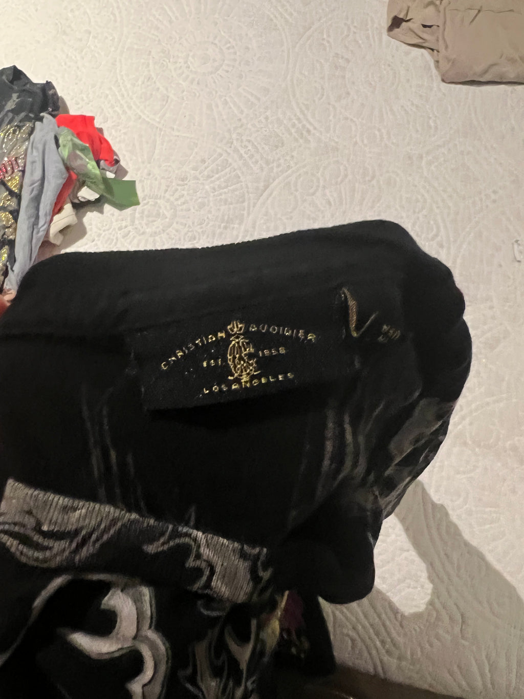 Christian Audigier graphic top
