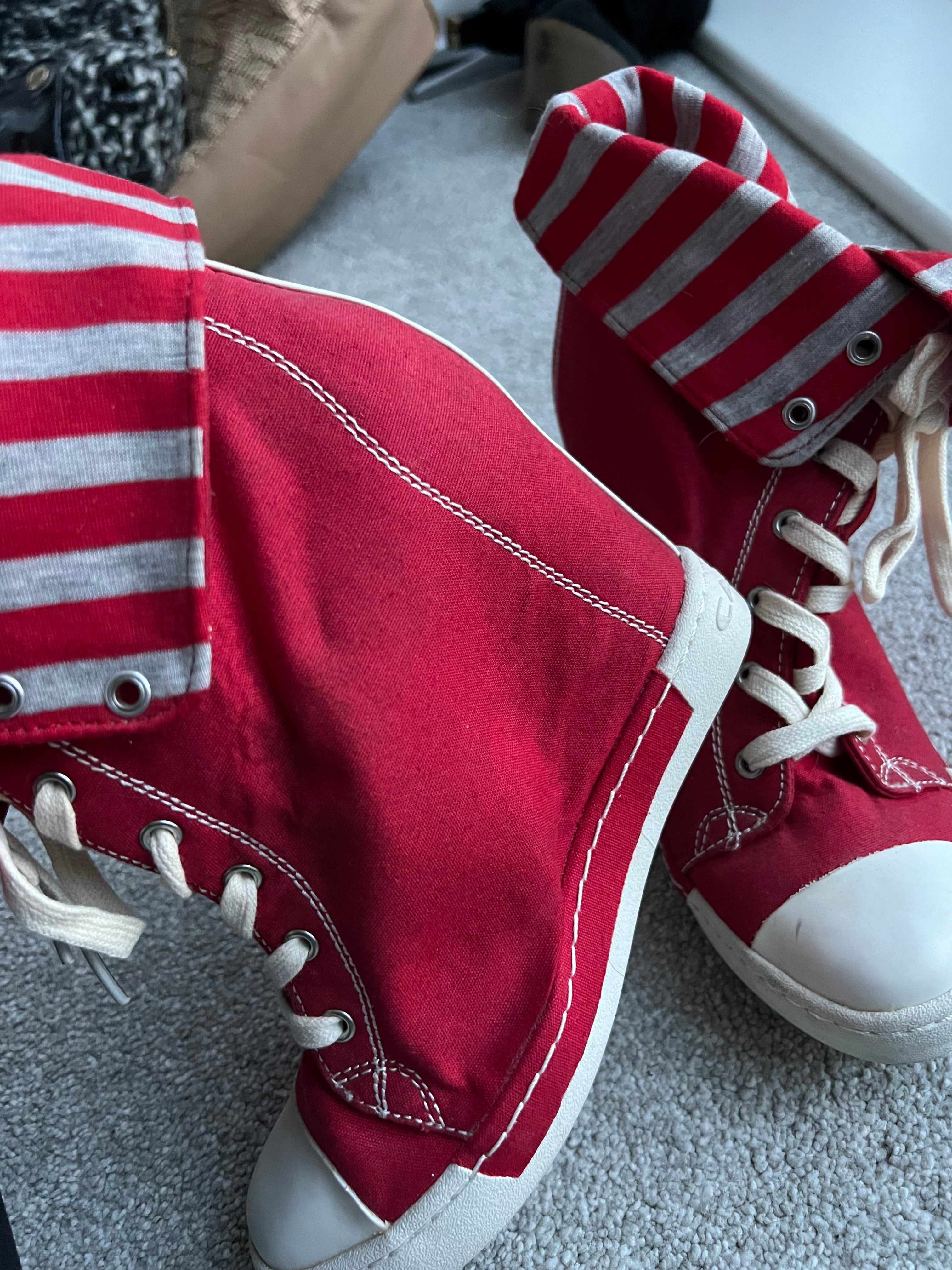 Red wedge trainers