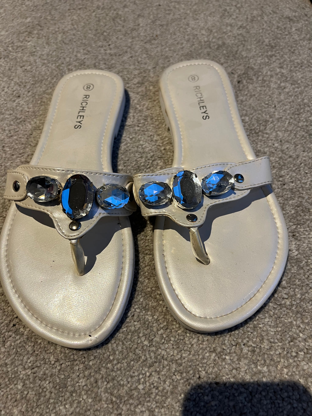 Cream jewel flip flops