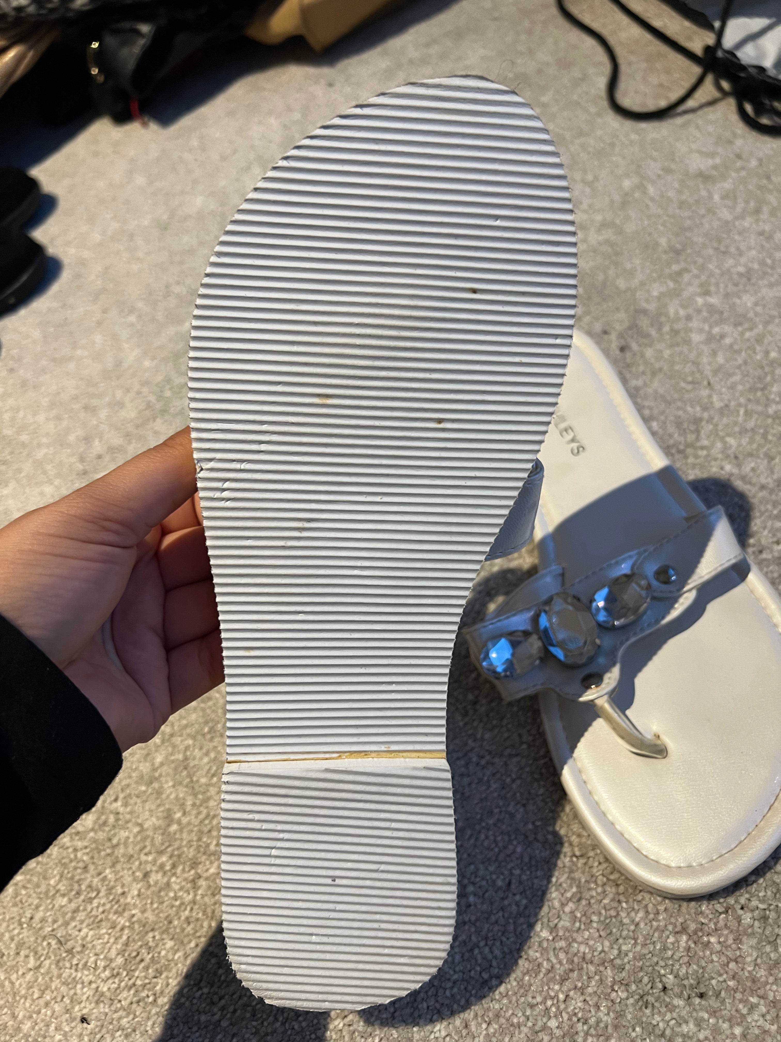 Cream jewel flip flops