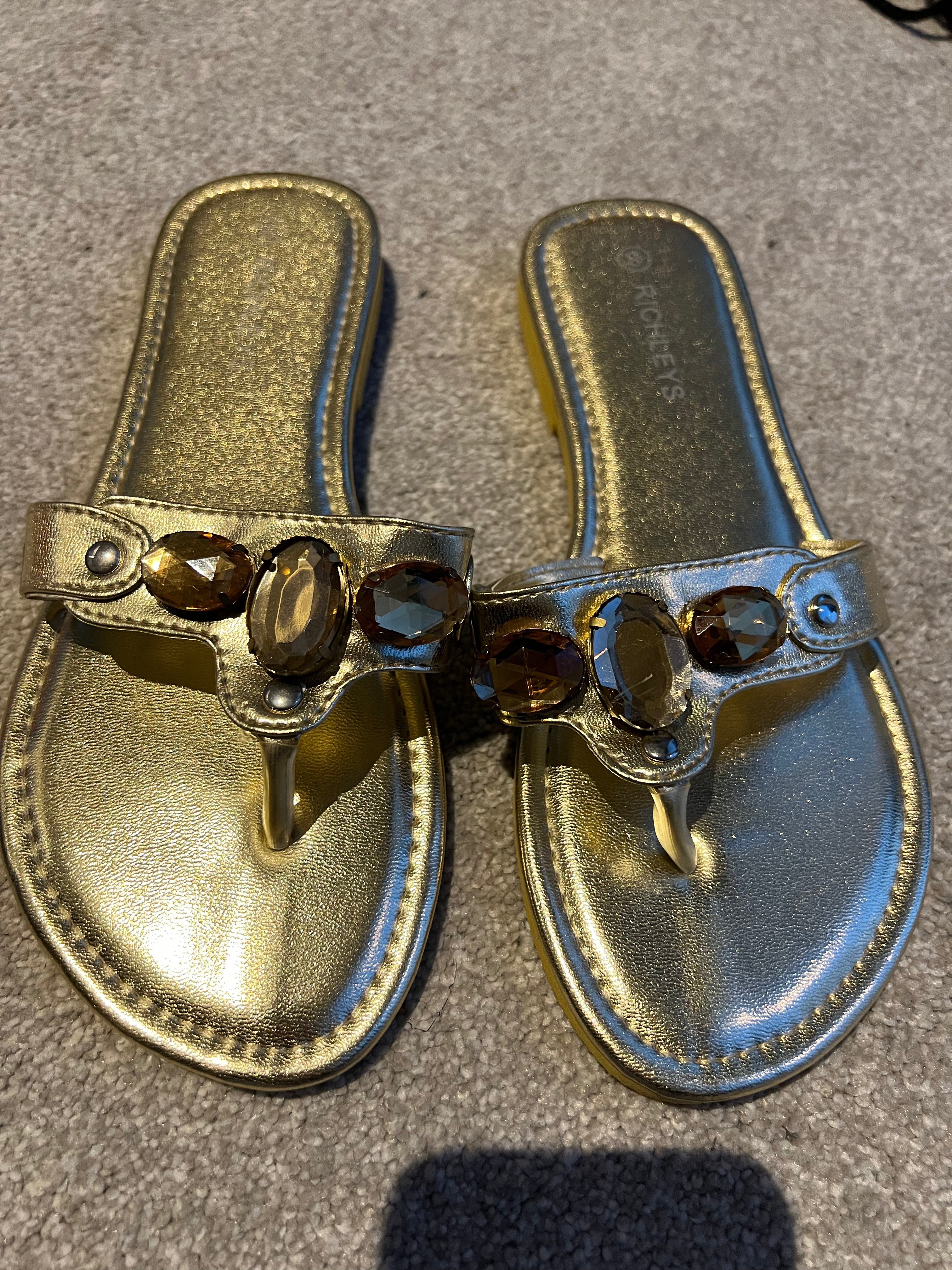 Gold jewel flip flops