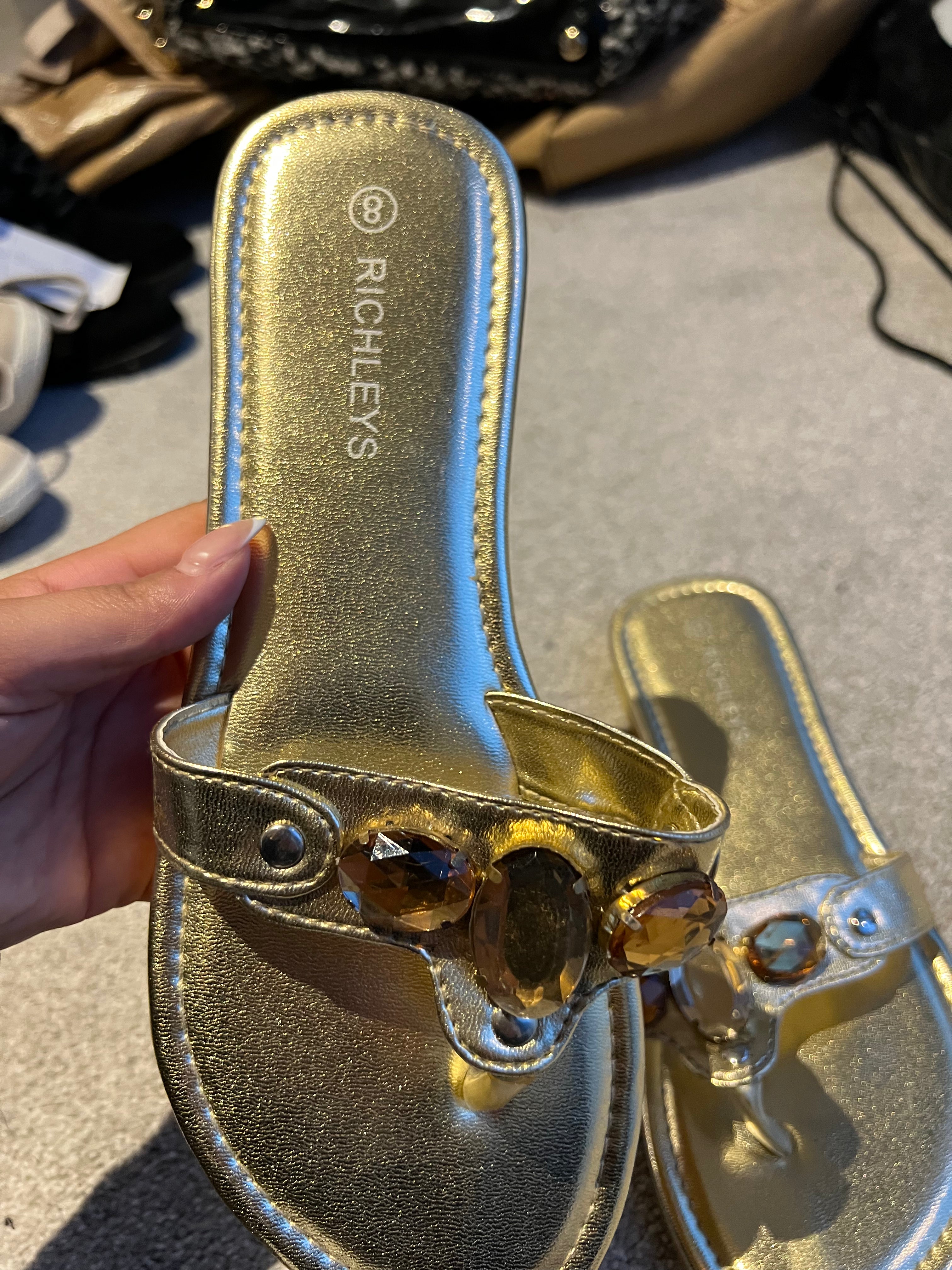 Gold jewel flip flops
