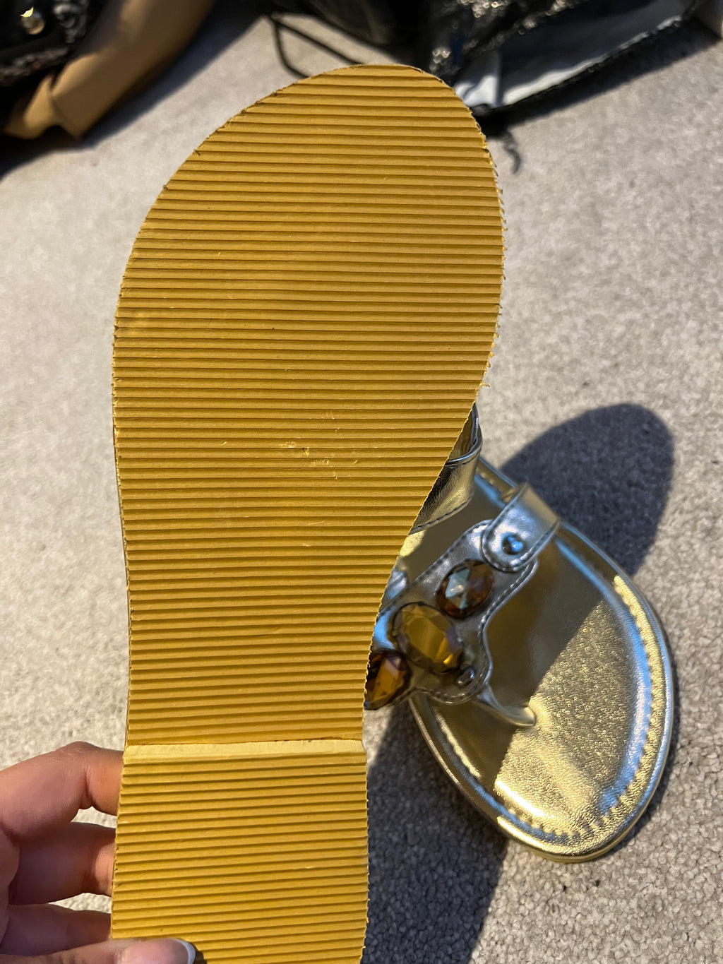 Gold jewel flip flops