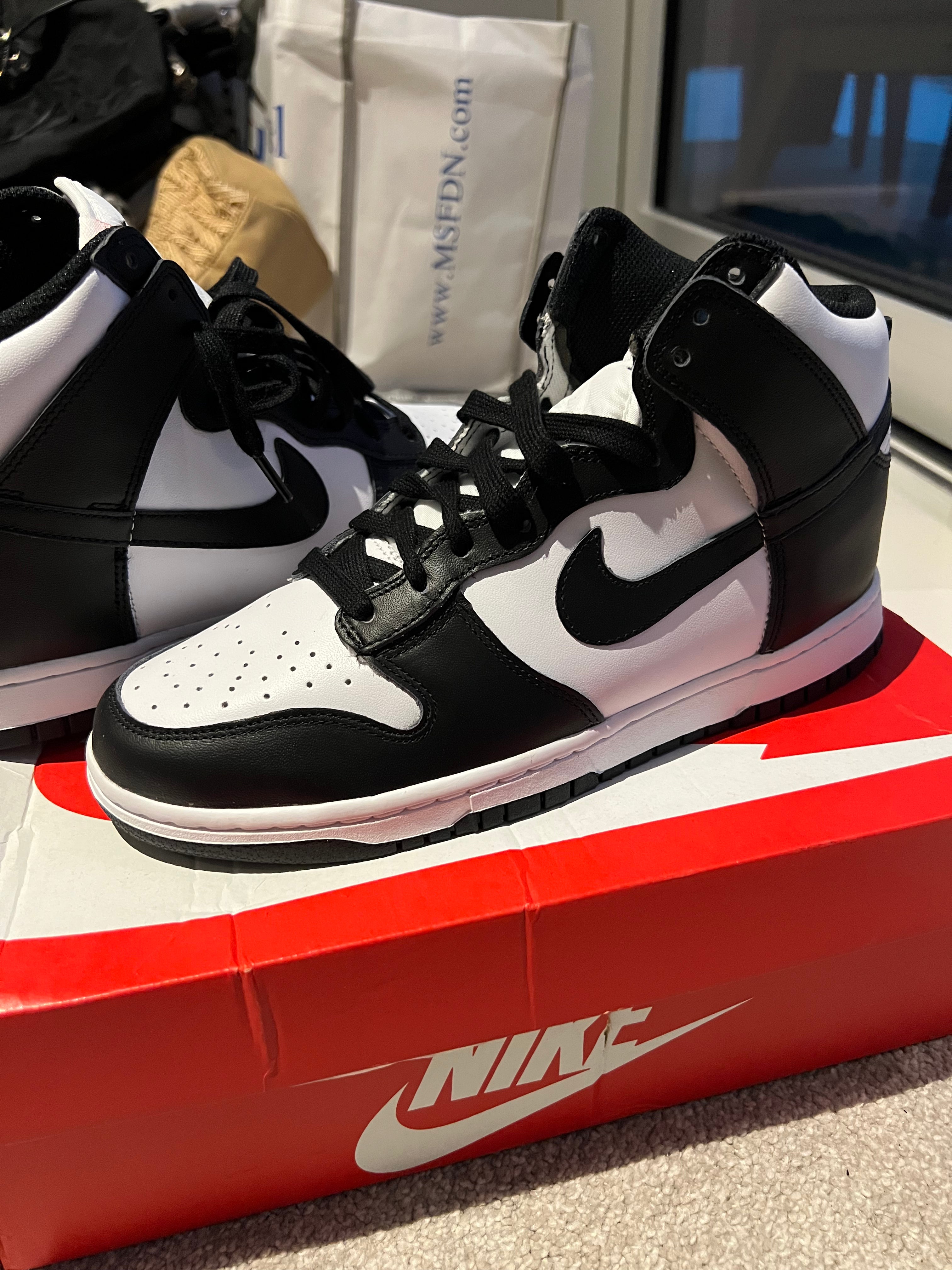 Black/white nike high top dunks