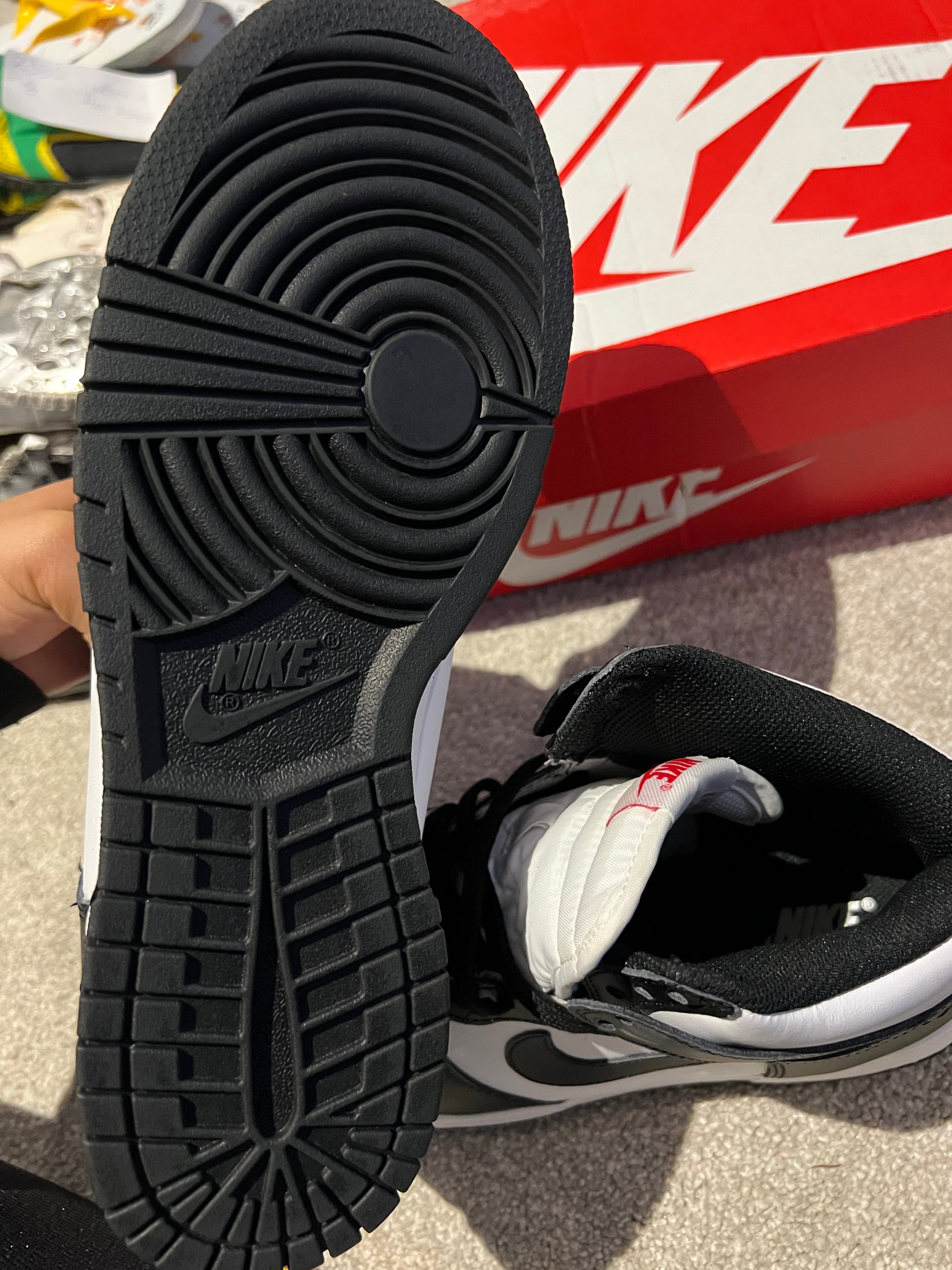 Black/white nike high top dunks