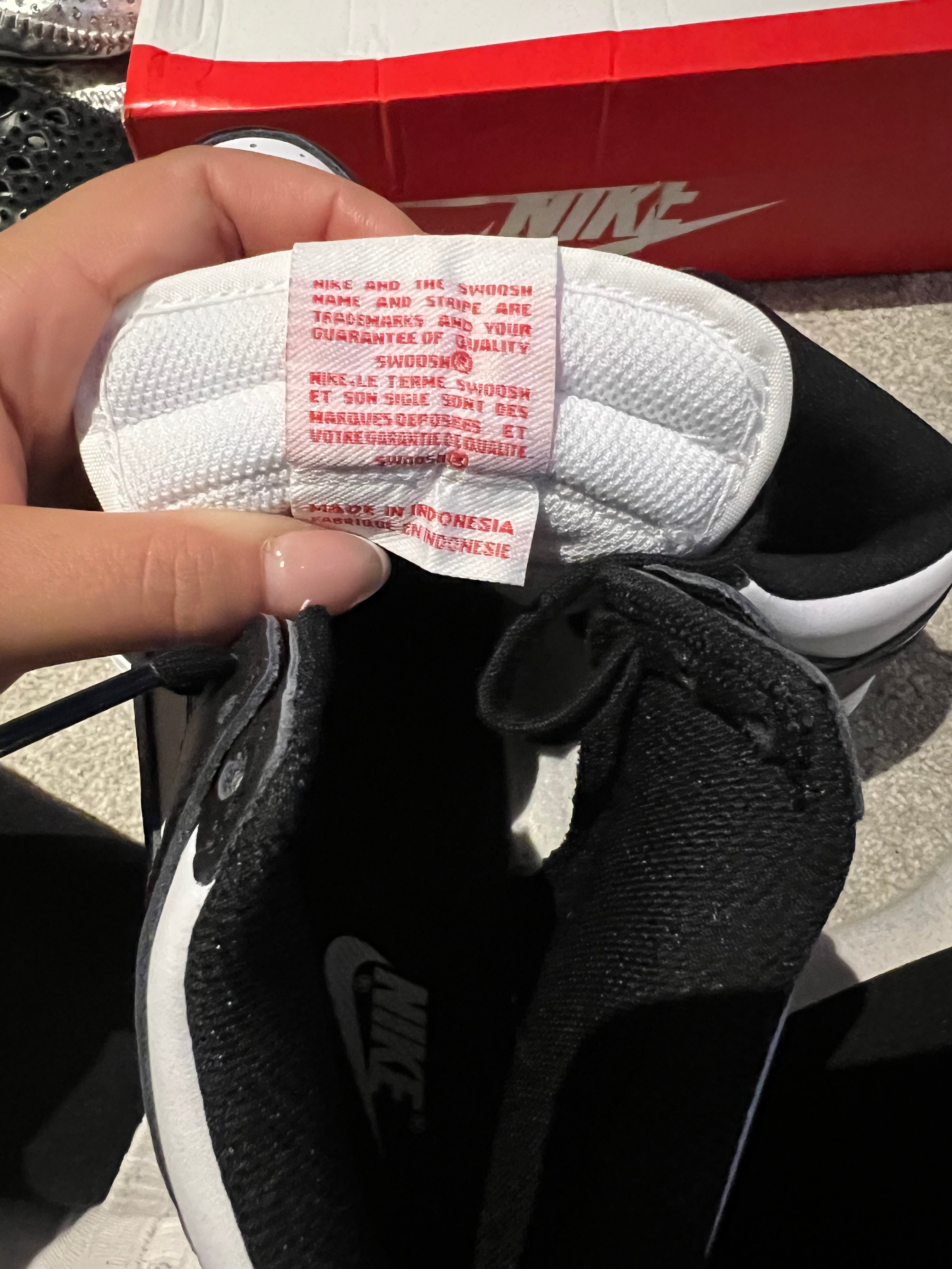 Black/white nike high top dunks