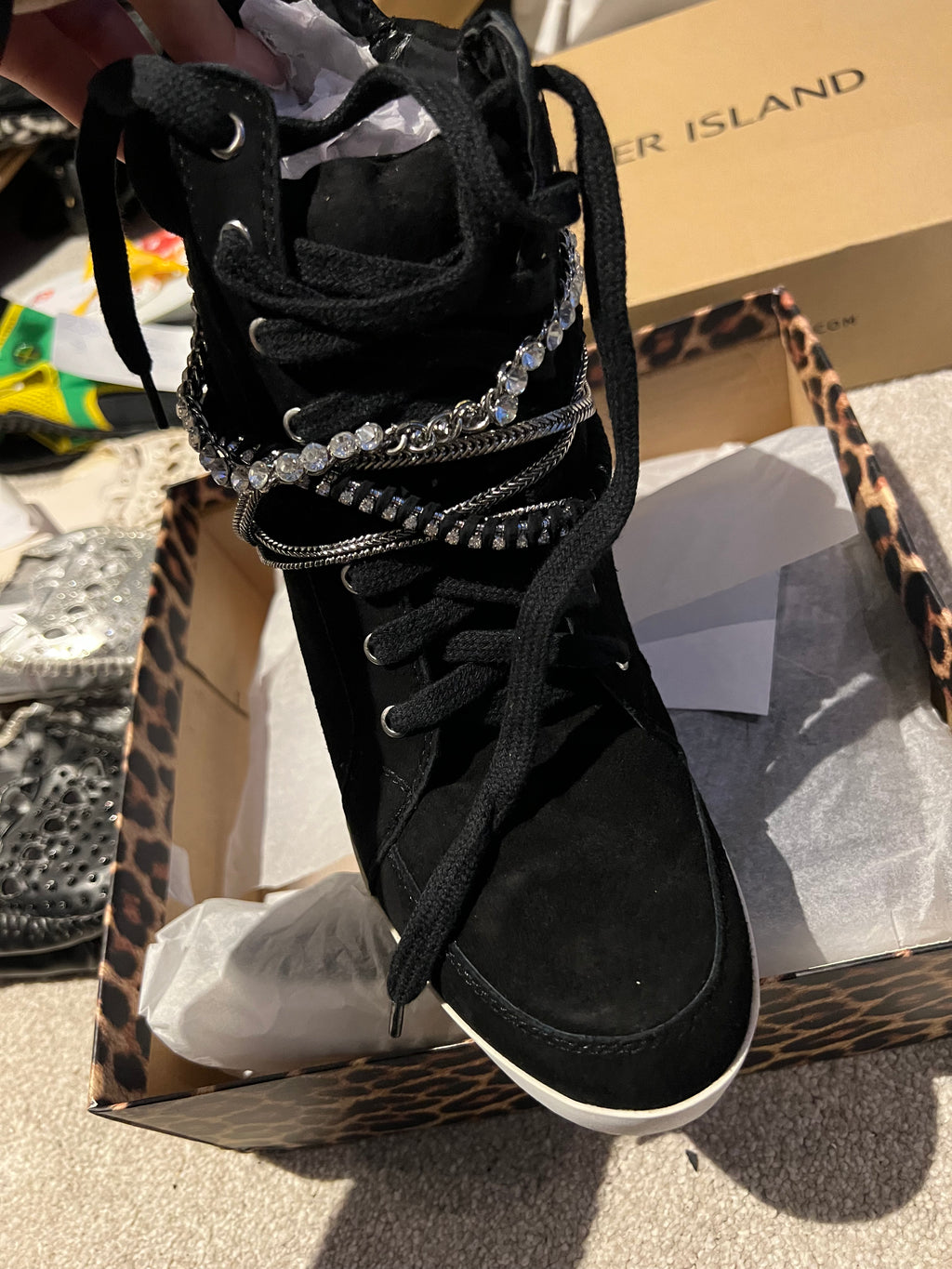 Black wedge sneakers with chains