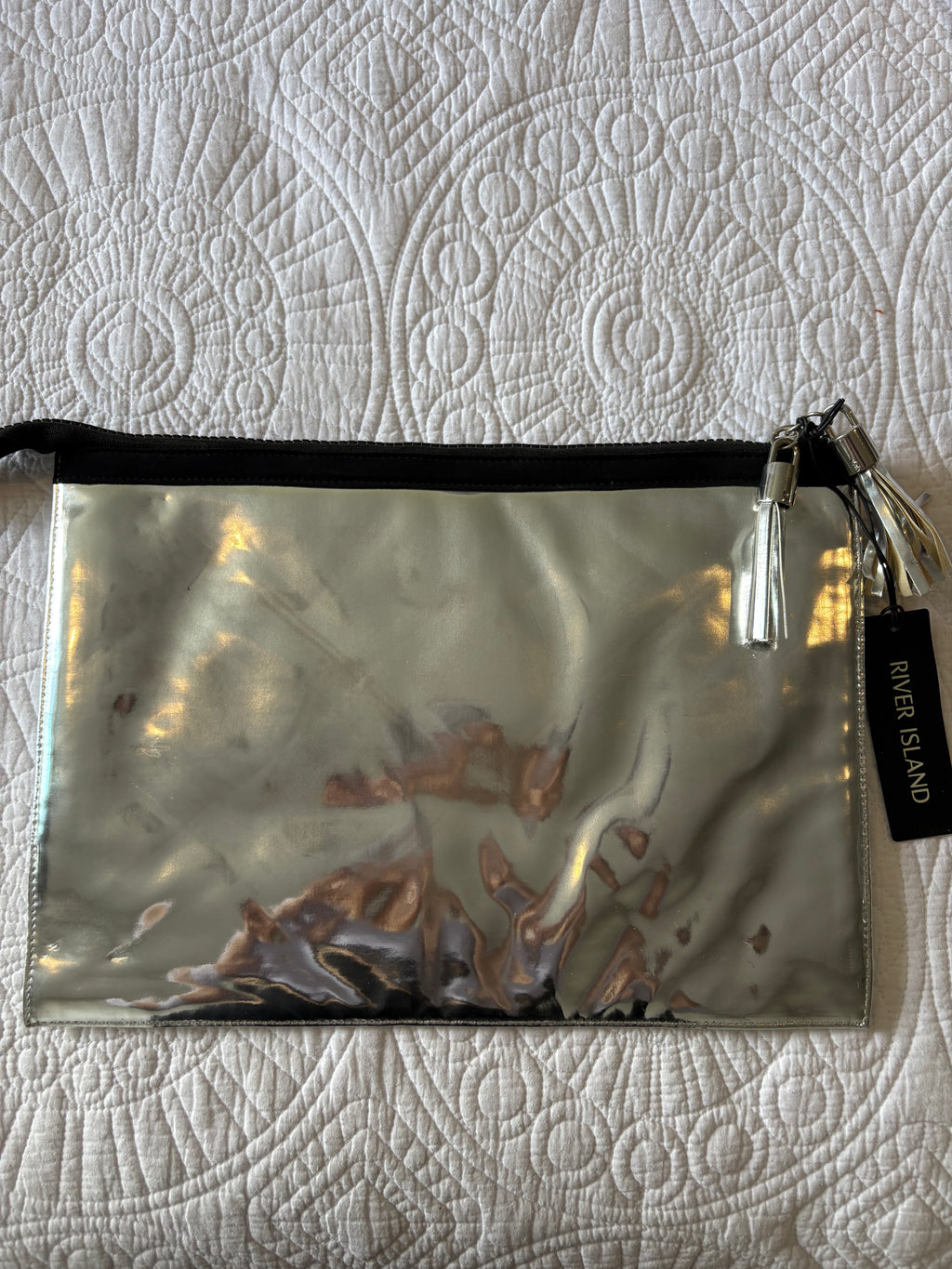 Metallic / mirror effect clutch bag