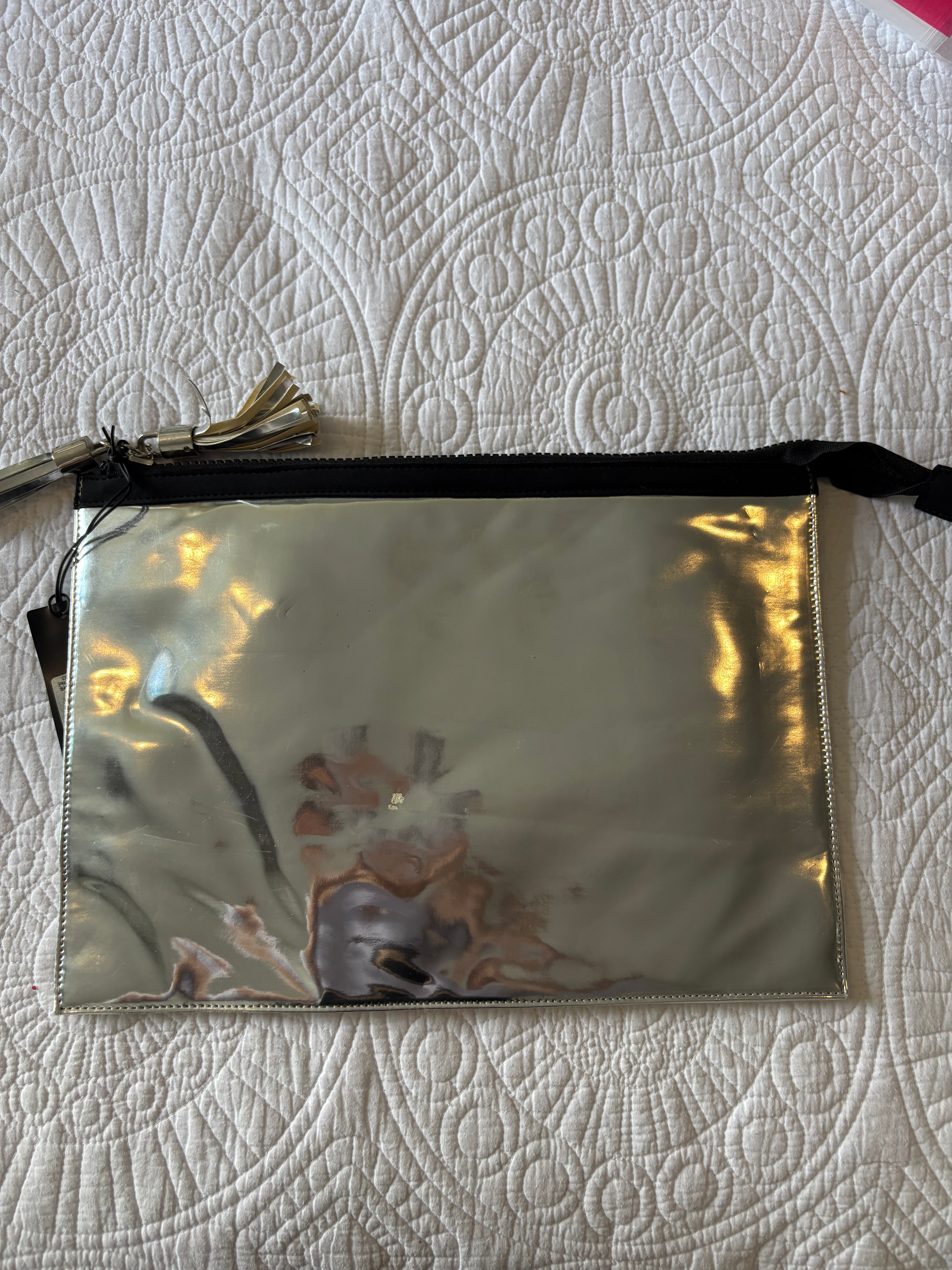 Metallic / mirror effect clutch bag